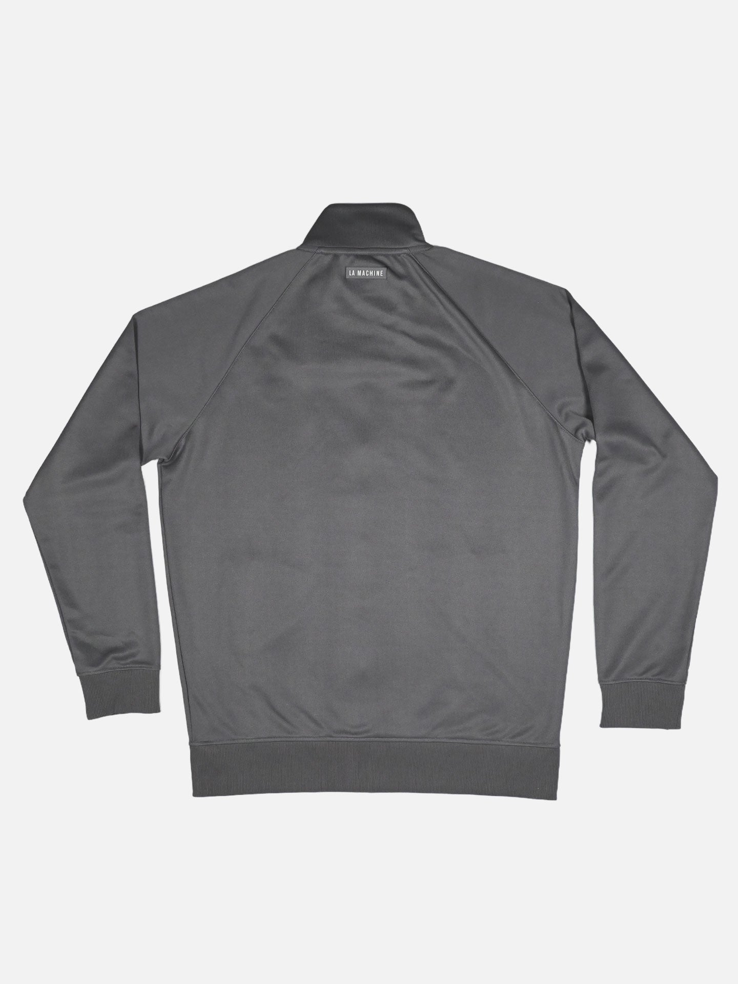 The La Machine Cycle Club Coffee Ride Winners Club Track Jacket in Steel Grey is shown laid flat, back up. Featuring a short collar and ribbed cuffs and waistband, its perfect for casual coffee rides or as your go-to cycling track jacket.