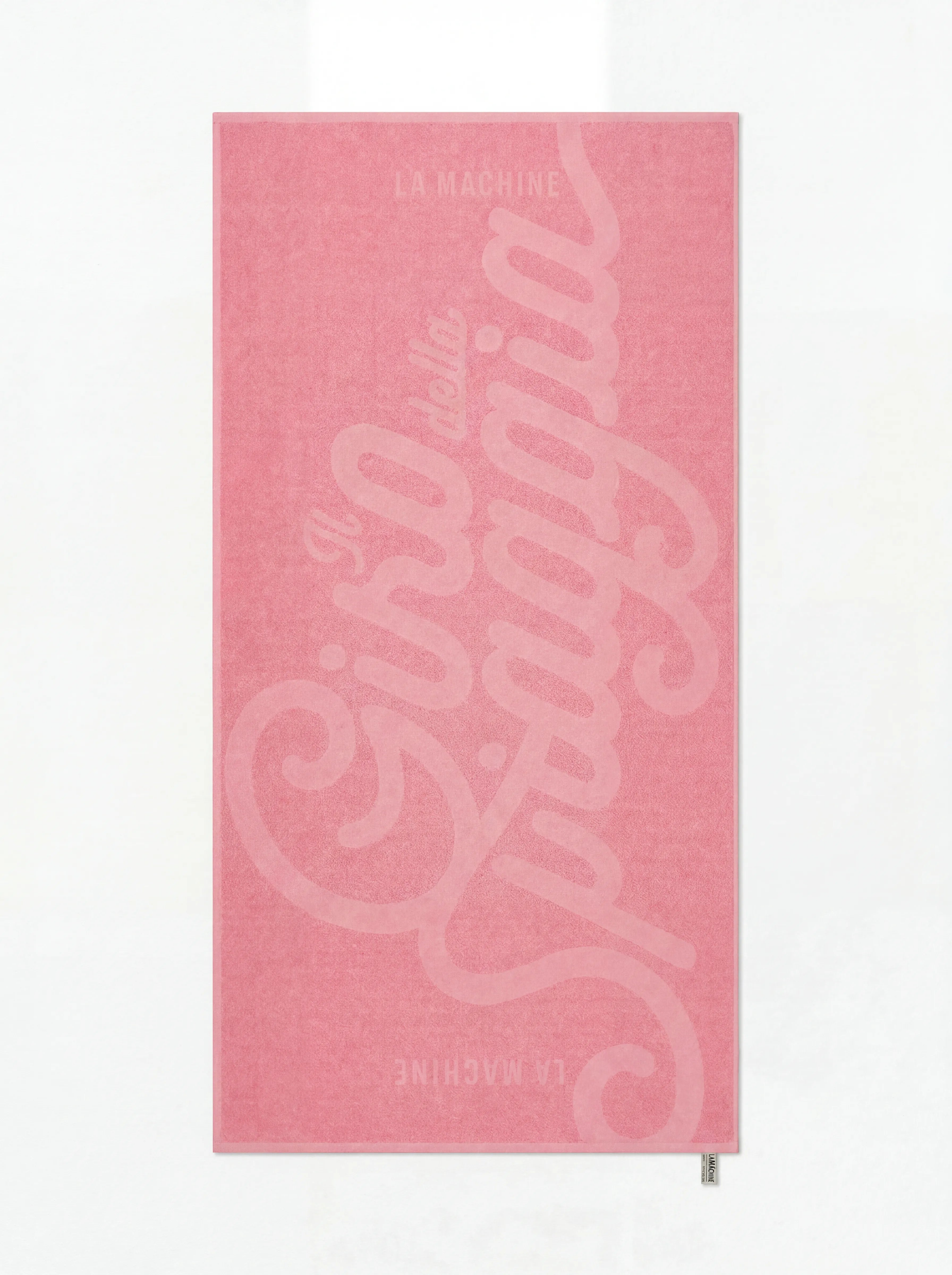 Il Giro della Spiaggia beach towel by La Machine in Giro pink — soft cotton, generously sized, inspired by la corsa rosa.