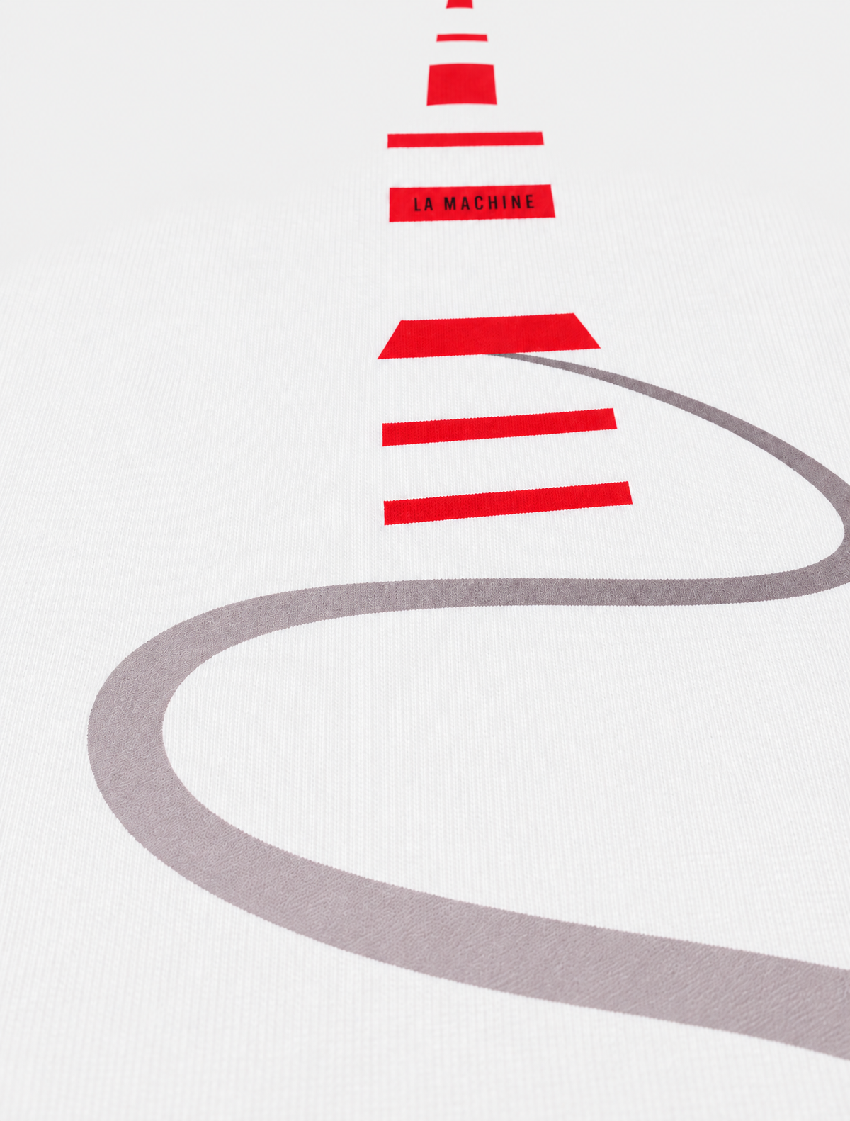 Close-up of the Ventoux - T-shirt - Off White by La Machine Cycle Club.