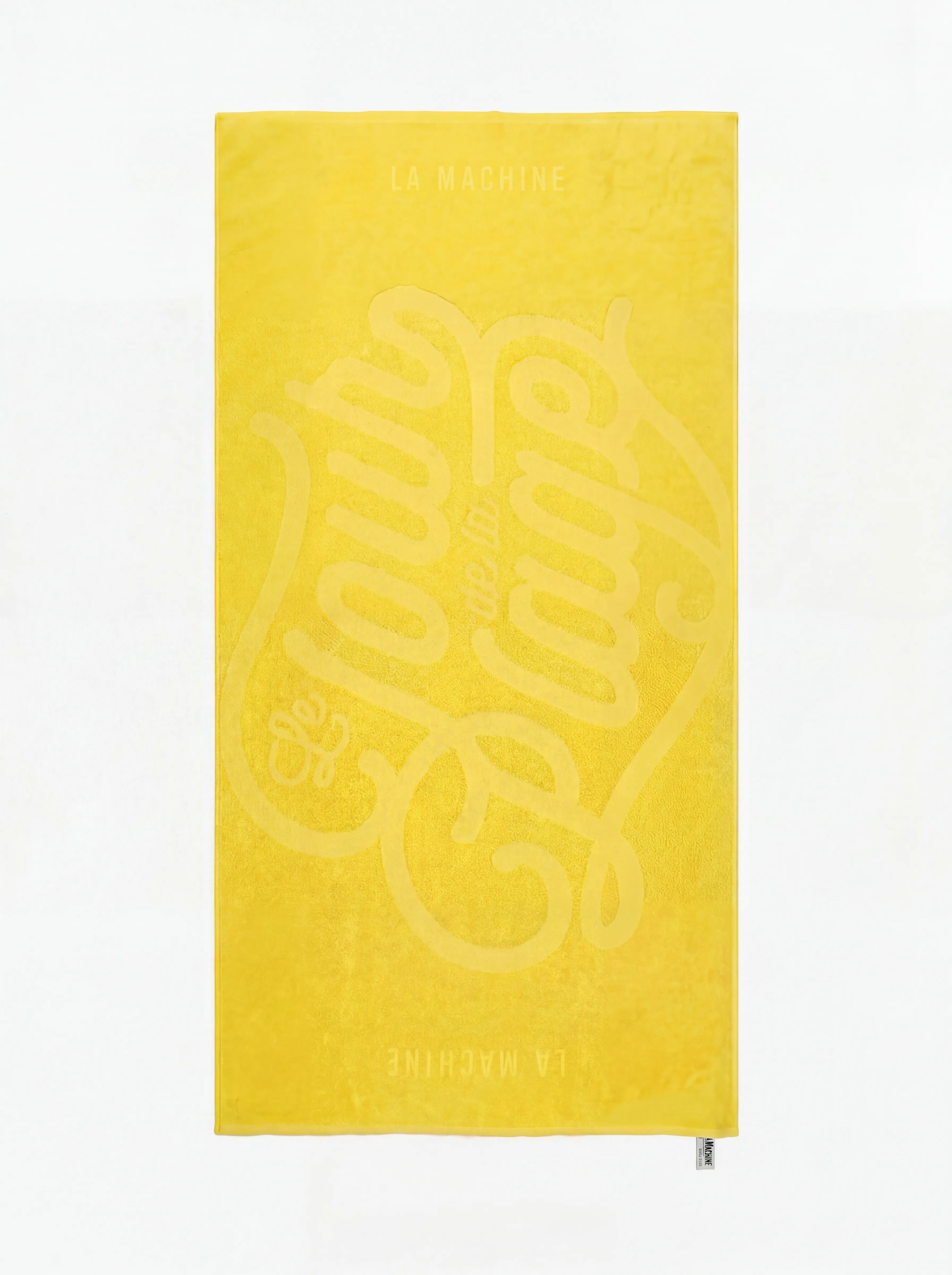 Le Tour de la Plage beach towel by La Machine in yellow — oversized soft cotton with a maillot jaune state of mind.