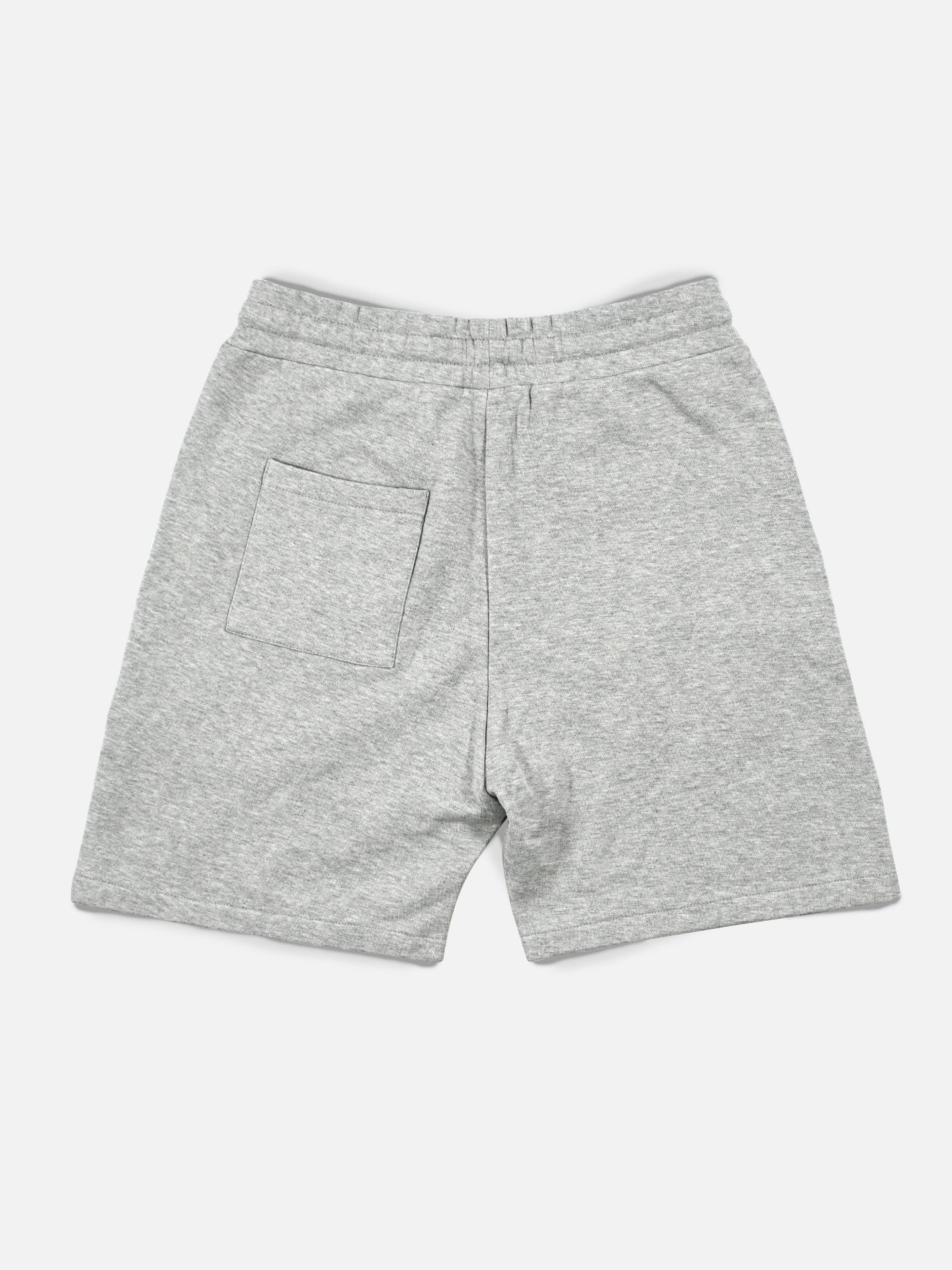 La Machine Cycle Clubs Beyond the Bike Sweatshorts in Melange Grey feature a relaxed fit, elastic waistband, and a single right back pocket, shown flat on a white background.