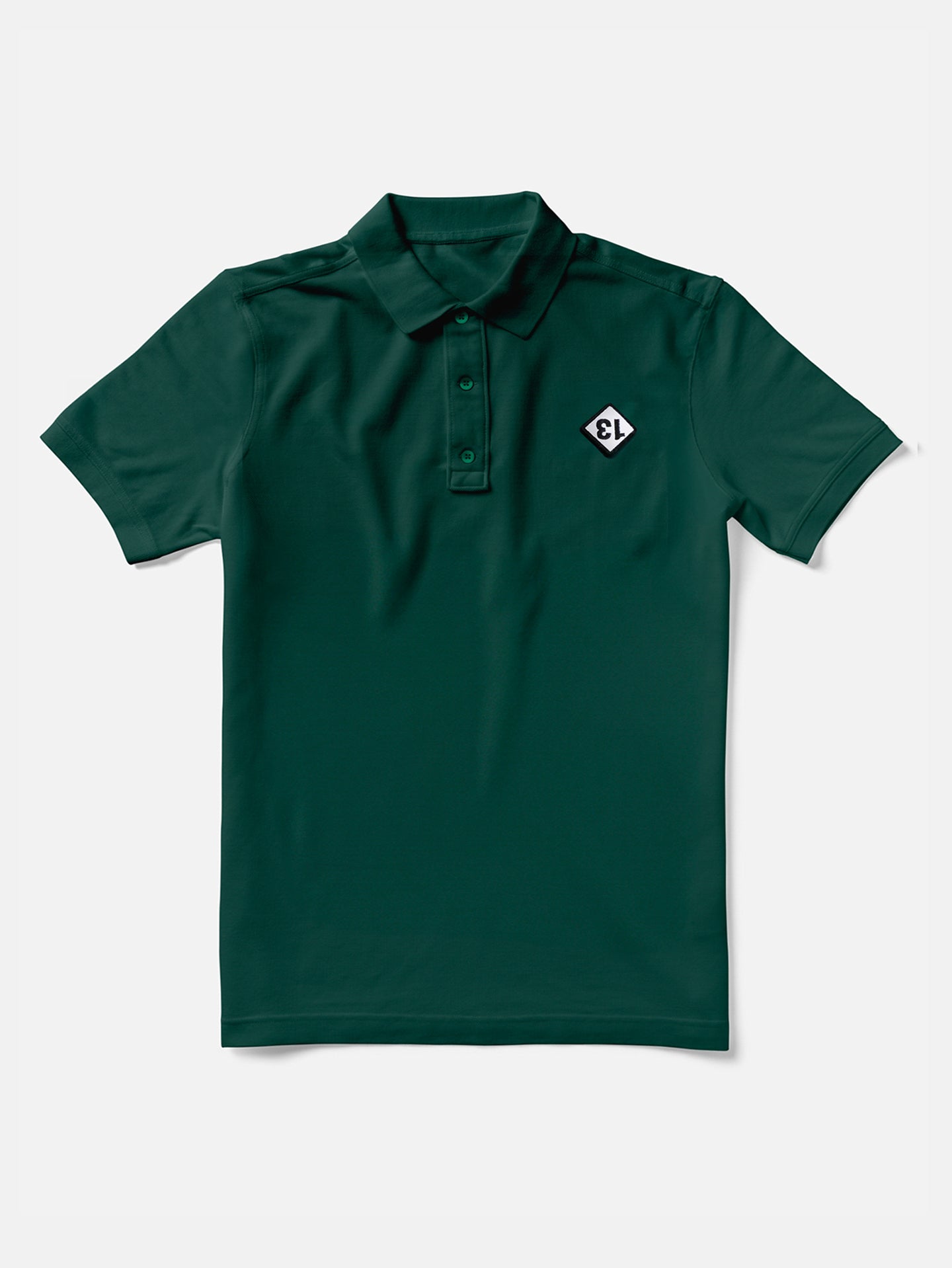 The La Machine Cycle Club Bib Number 13 - Patch - Polo Shirt is a dark green premium stretch pique men’s polo with a three-button placket and an embroidered #13 patch on the left chest, shown laid flat on a white background.