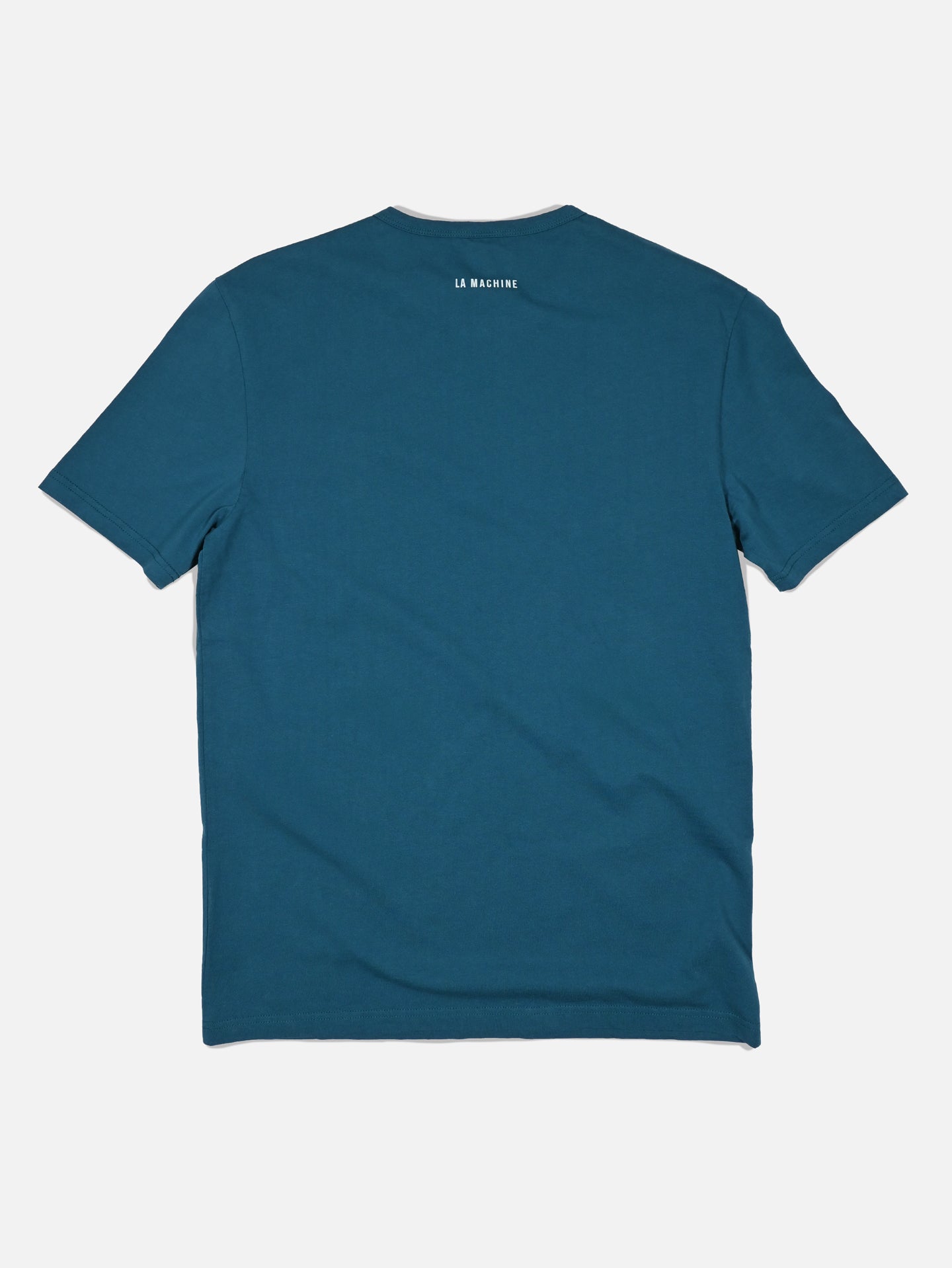 The Coffee Ride Winners Club - T-shirt in blue by La Machine Cycle Club is shown from the back, featuring a small logo near the neckline. Unisex fit, perfect for cycling or coffee outings. Shirt is laid flat on a white background.