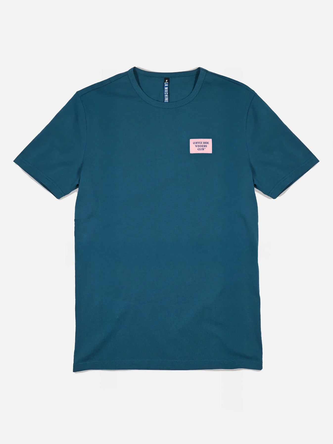 The La Machine Cycle Club Coffee Ride Winners Club T-shirt in blue is a unisex tee featuring a small pink LETS STAY UP LATER label on the left chest, shown laid flat on a white background. Perfect for your next coffee ride.