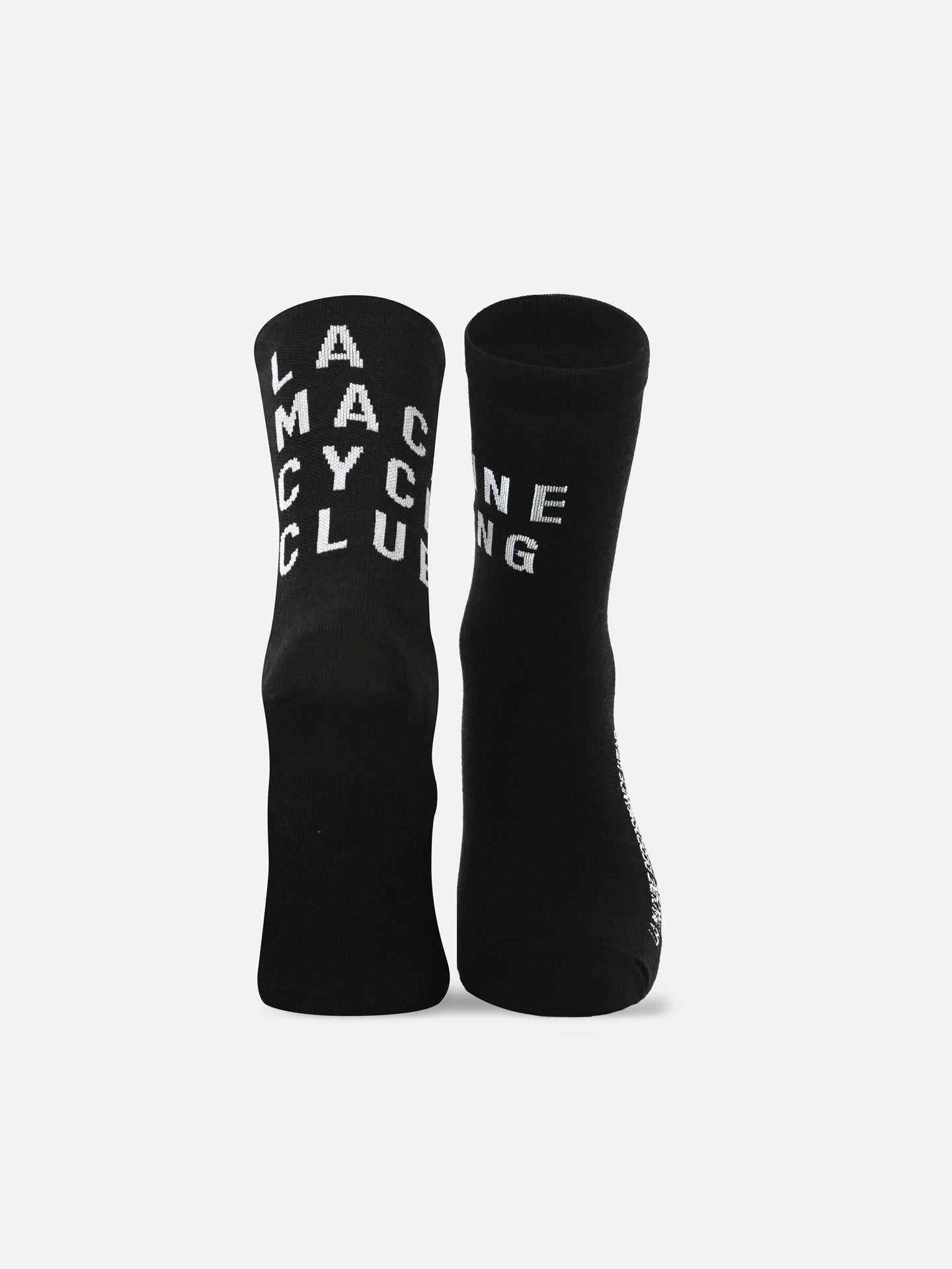 Two unisex LMCC - Cycling Socks - Merino by La Machine Cycle Club stand upright on a white background; the left displays LA MACNE CYCLUB and the right reads C LING in white text.
