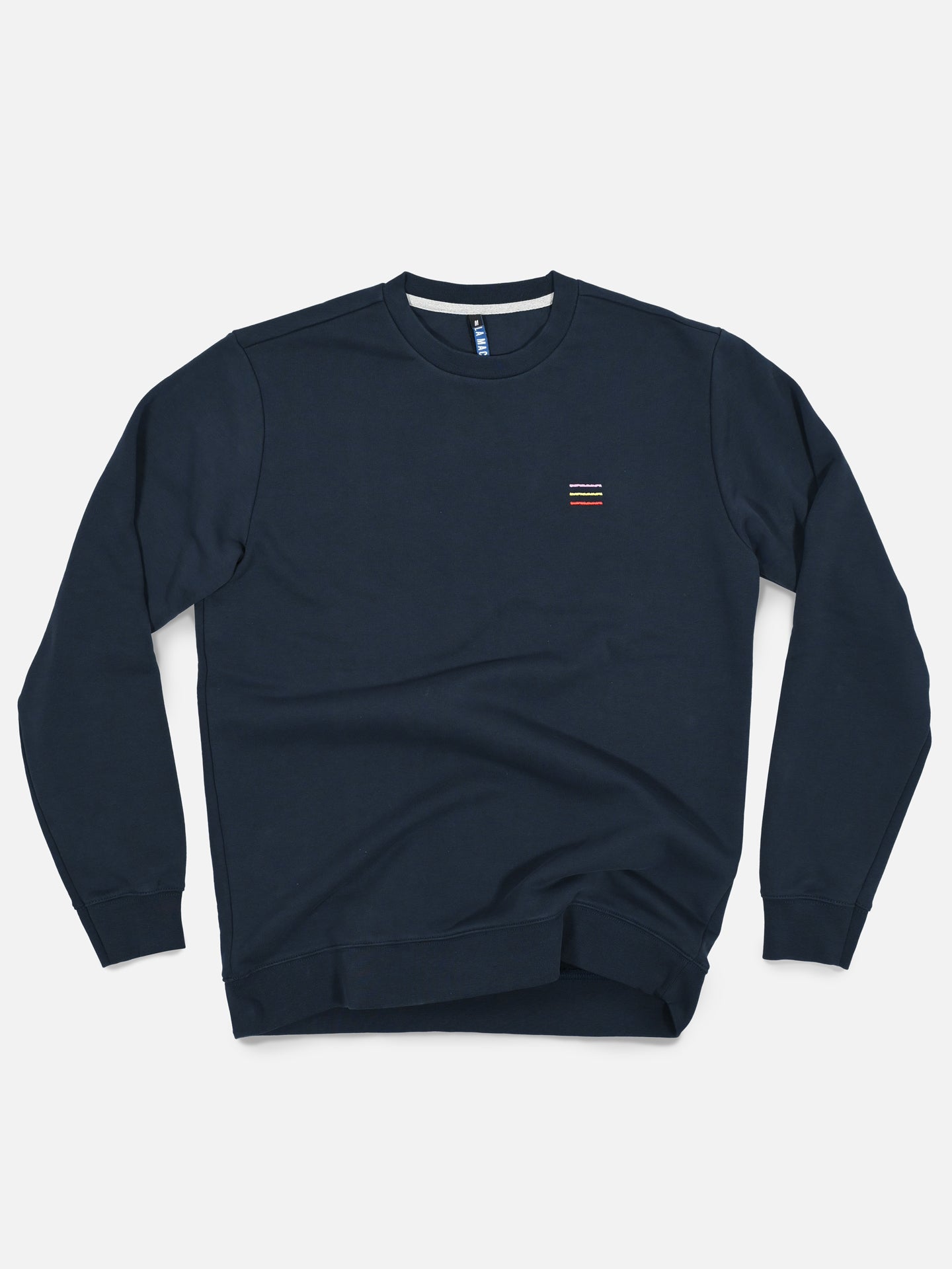 The La Machine Cycle Club Grand Tours III - Embroidered Sweatshirt is a navy blue mens crewneck with long sleeves and small red, white, and yellow Grand Tour-inspired stripes embroidered on the left chest, shown flat on a white background.