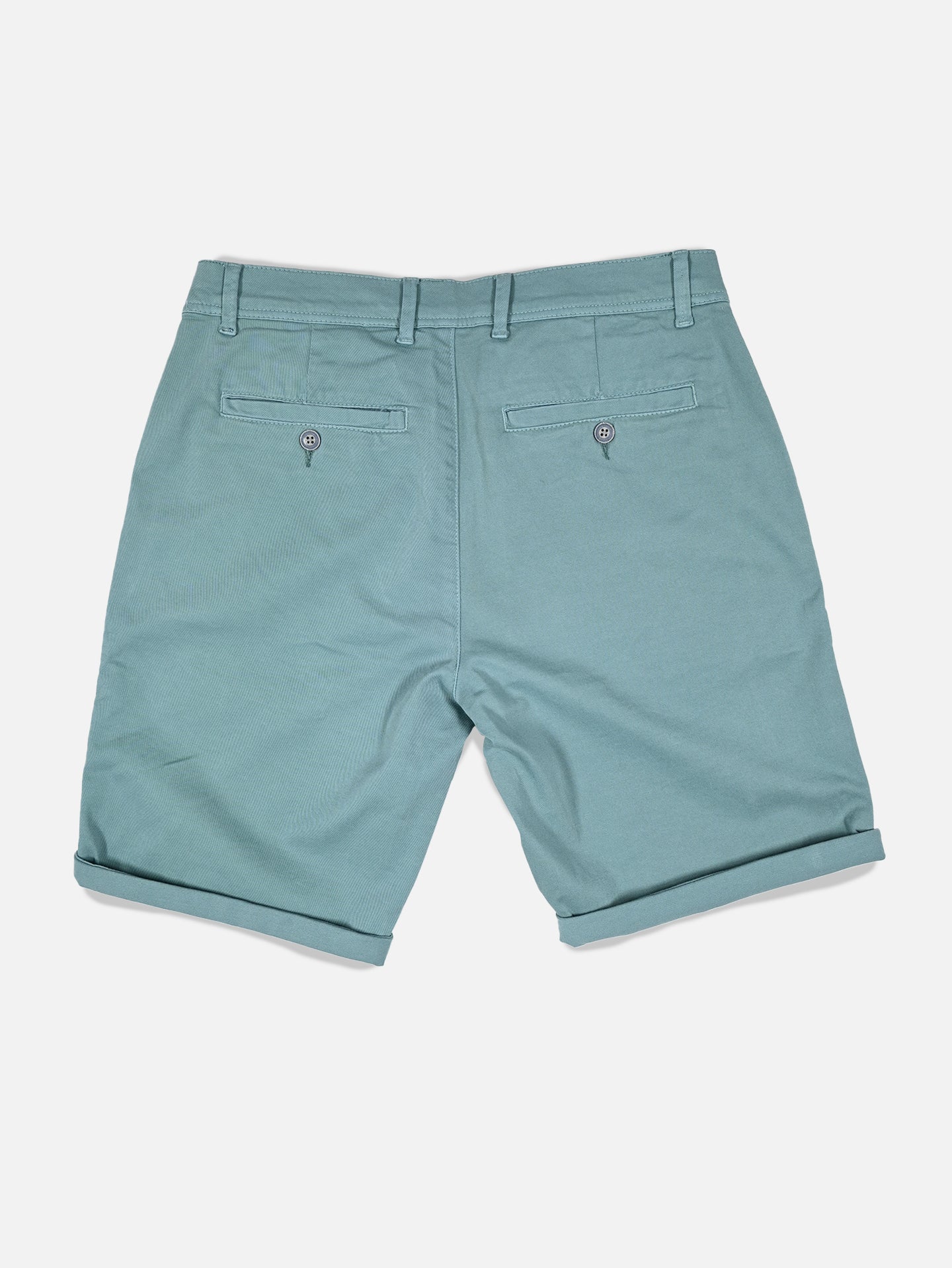 The Grand Tours - Rest Day Bermuda - Antarctics by La Machine Cycle Club are teal blue mens Bermuda shorts with a semi-tailored fit, two buttoned welt pockets at the back, belt loops, and rolled-up hems.