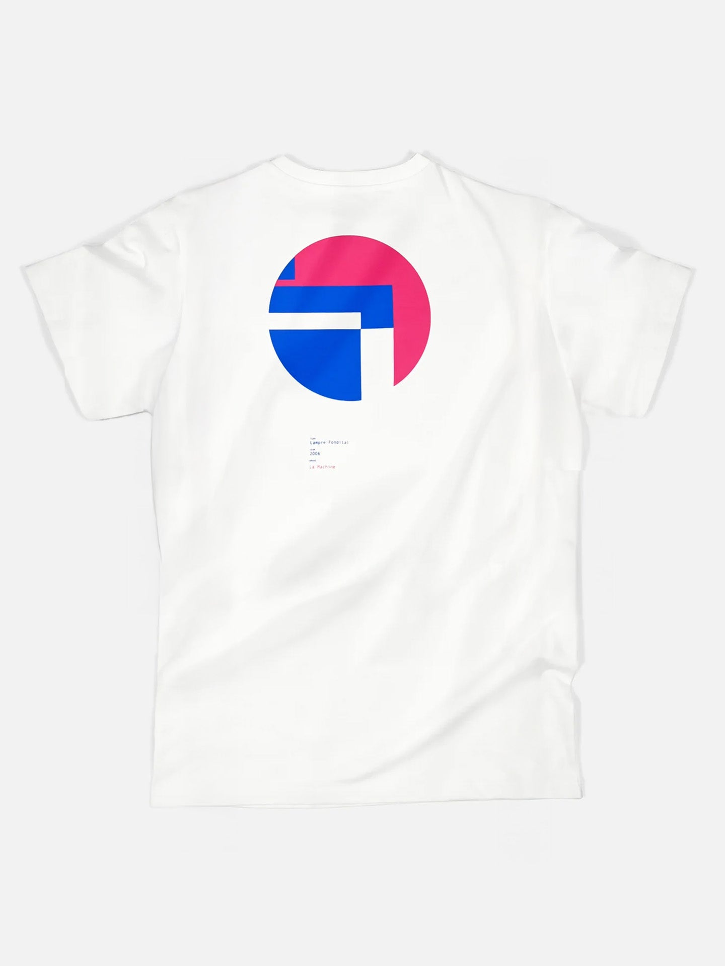 The Lampre Fondital 06 Loose Fit T-shirt by La Machine Cycle Club is white, with a large pink and blue geometric circular graphic on the back—echoing classic Lampre Fondital jersey colors—and small black text beneath.