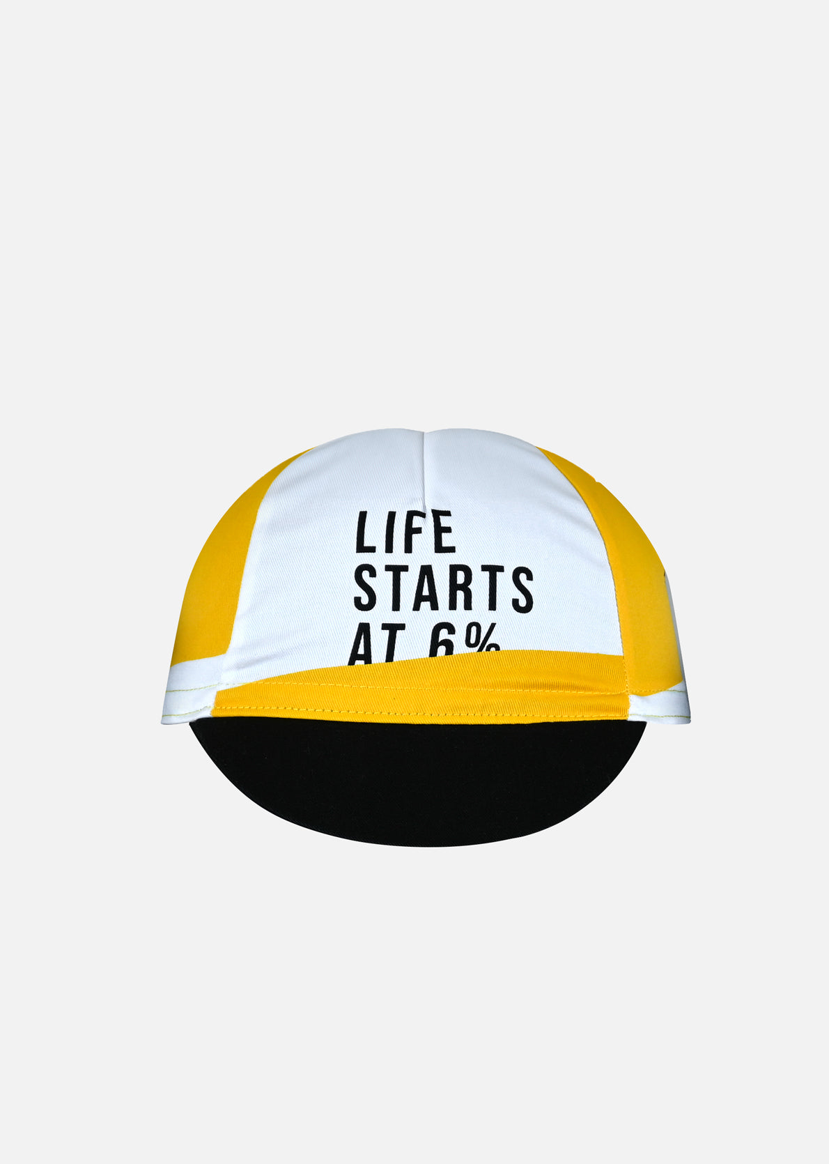 The La Machine Cycle Club Life starts at 6% Cycling Cap is a classic yellow and white, 100% cotton cap with the phrase LIFE STARTS AT 6% in black on the front, shown against a plain white background.