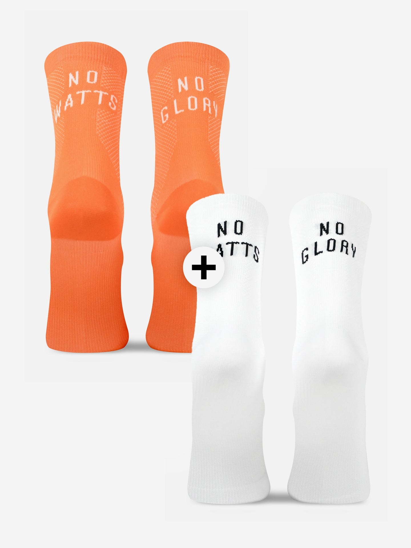 The No Watts No Glory Cycling Socks Bundle by La Machine Cycle Club includes four athletic socks: one orange pair with white text and one white pair with black text. Seamless toes and elastic fit offer comfort. Sold as a set.