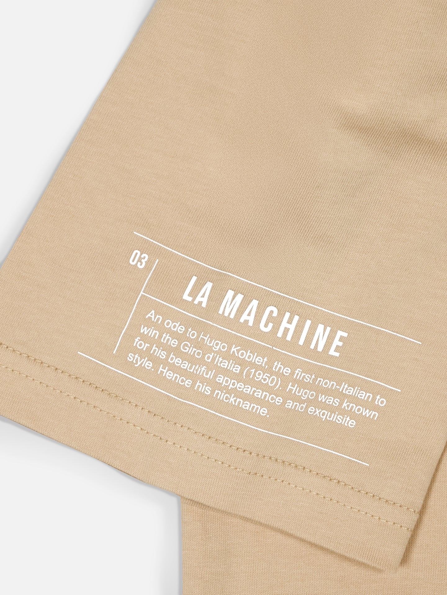 Close-up of the Pedaleur de Charme - T-shirt in sand by La Machine Cycle Club: a unisex cotton tee honoring Hugo Koblet, the first non-Italian Giro d’Italia winner (1950) and his legendary elegance.