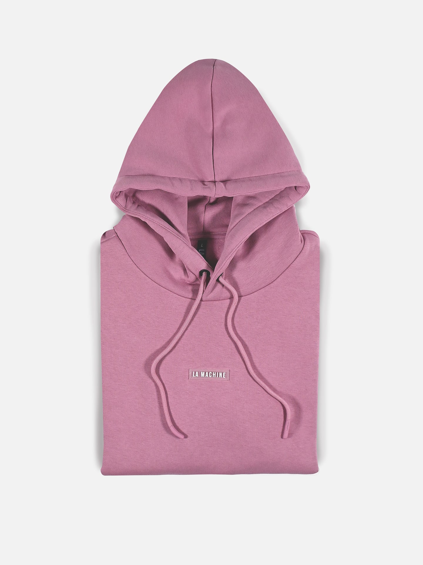 A folded mauve Vai Allez Vamos hoodie from La Machine Cycle Club, featuring a hood, drawstrings, and small white LA MACHINE embroidery on the chest, displayed on a white background.
