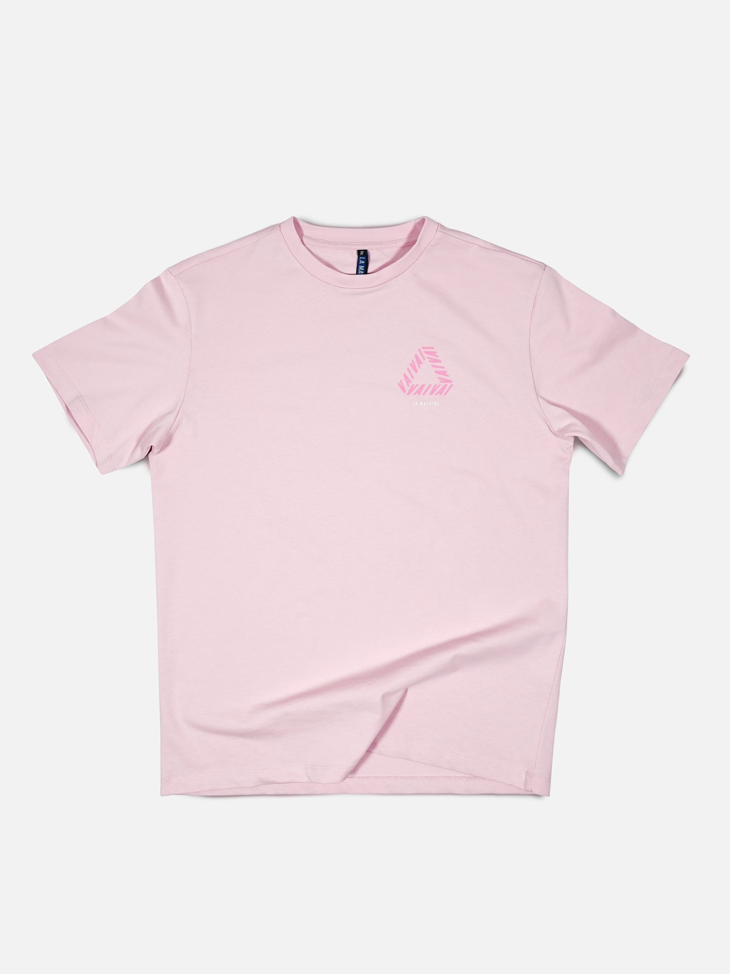 The Vai Vai - Loose Fit - Giro dItalia T-shirt by La Machine Cycle Club is a light pink cycling tee with a small dark pink geometric design on the left chest, shown against a plain white background.