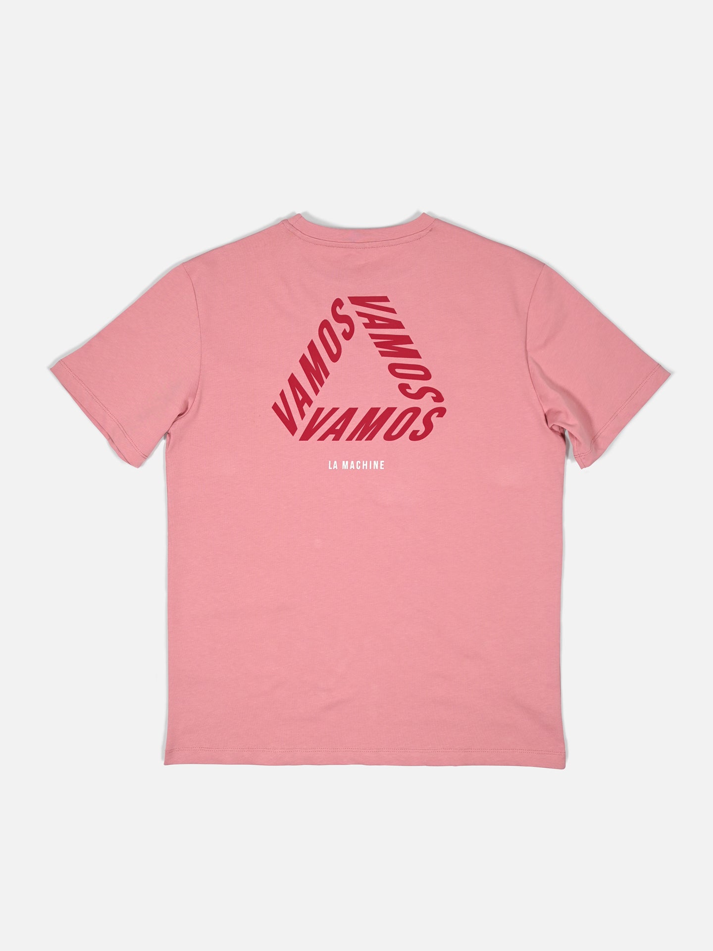 The Vamos - Loose Fit - Vuelta a España T-shirt by La Machine Cycle Club is a pink cycling tee inspired by Spanish cycling, with bold red “VAMOS” in a triangle on the back and small white “LA MACHINE” lettering underneath.