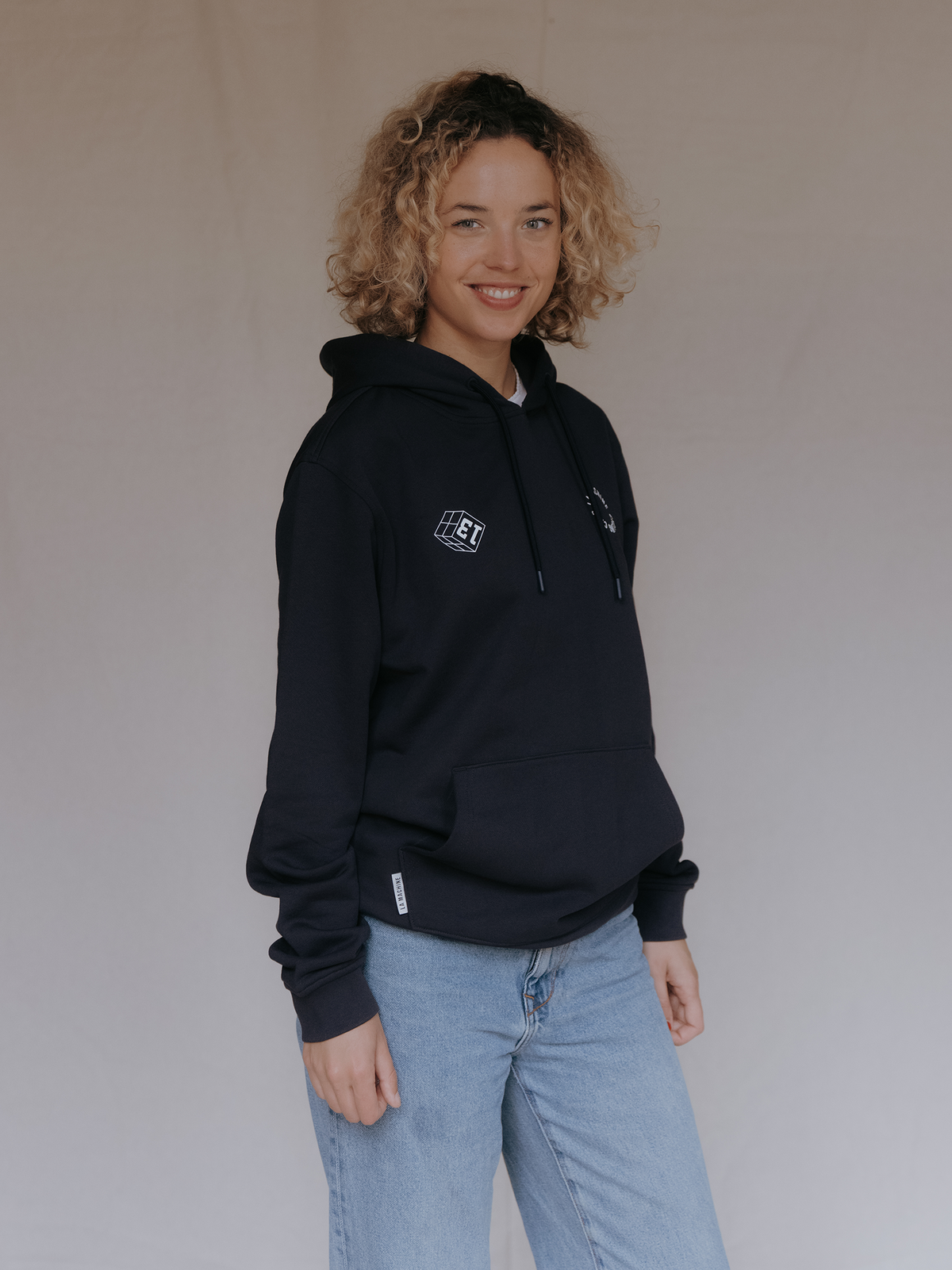 Close-up of the print on the Grand Tours Hoodie in dark navy blue by La Machine.