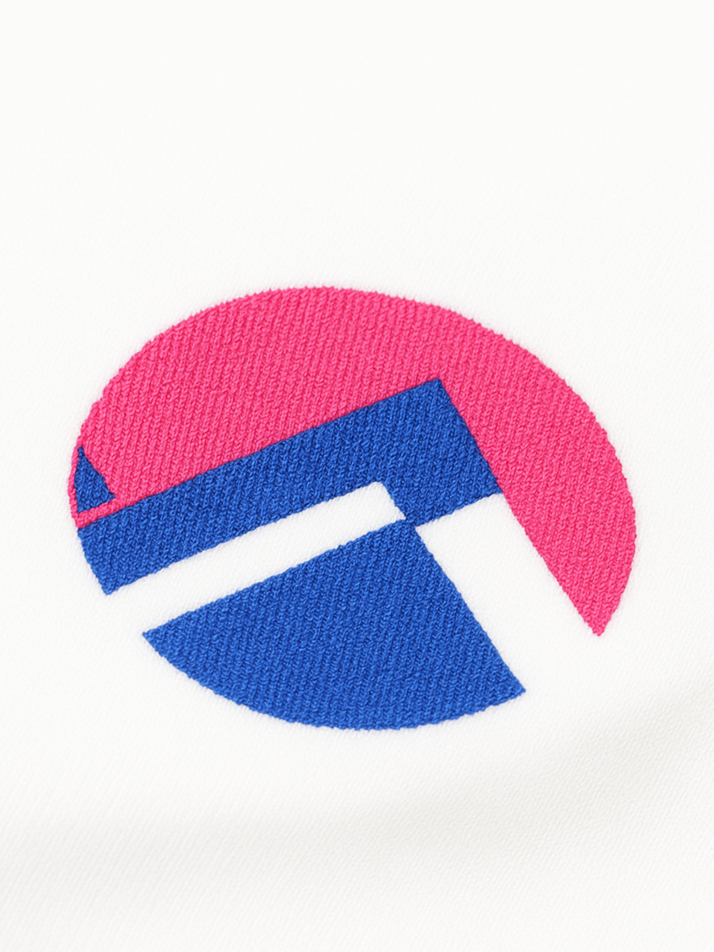 The Lampre Fondital 06 Star White sweatshirt by La Machine Cycle Club features a white base with a circular geometric design—red-pink on top, blue below, divided by angular lines—evoking a stylish cycling jersey.