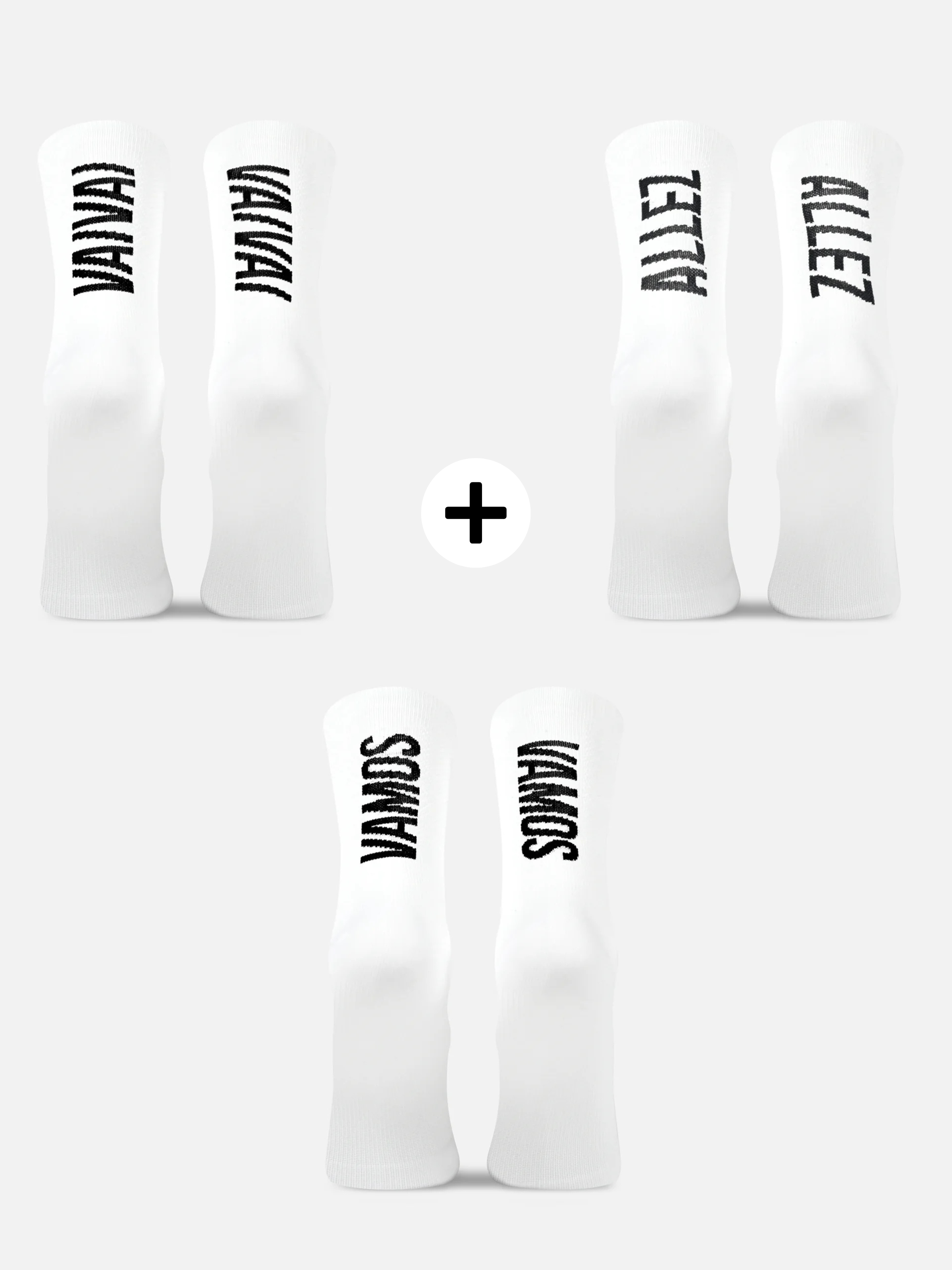 The Grand Tours - Cycling Socks - Bundle by La Machine Cycle Club includes four white pairs with black text: VAM, ALLEZ, and VAMOS—ideal for fans of iconic cycling tours. Plus sign separates top and bottom pairs.