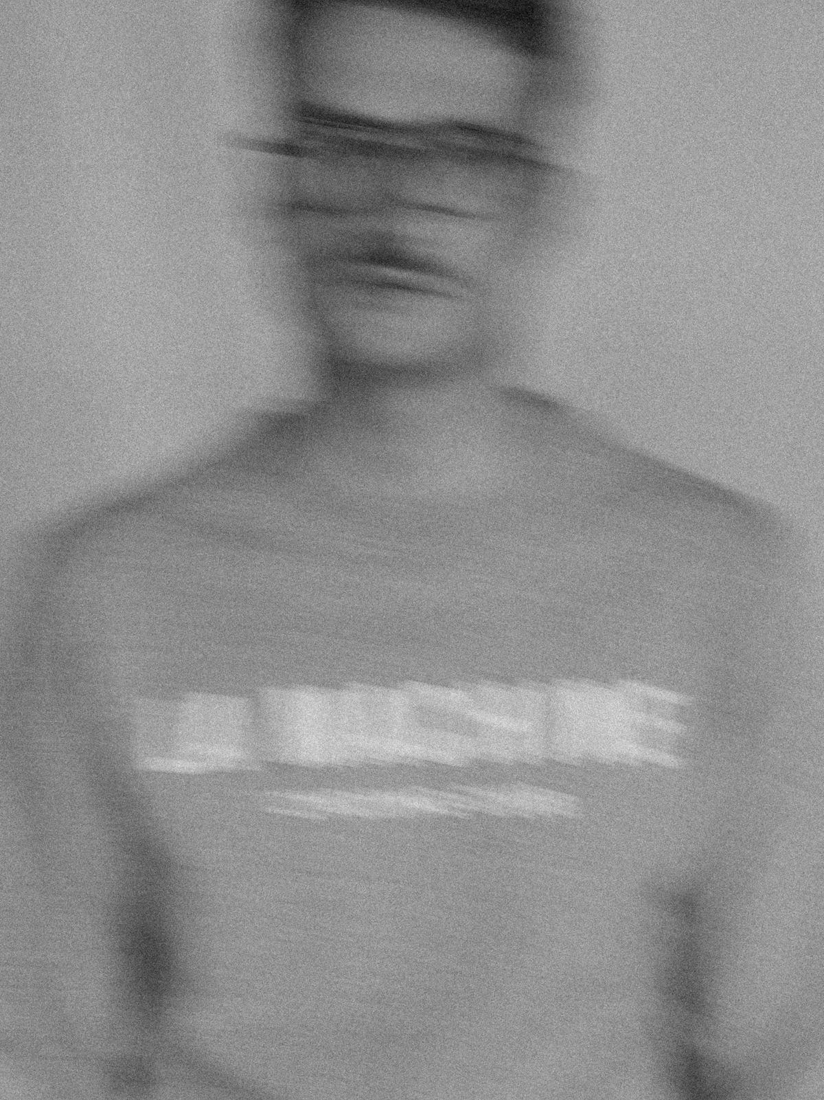 Close-up of the fabric on the La Machine Club Line Sweatshirt in grey melange.