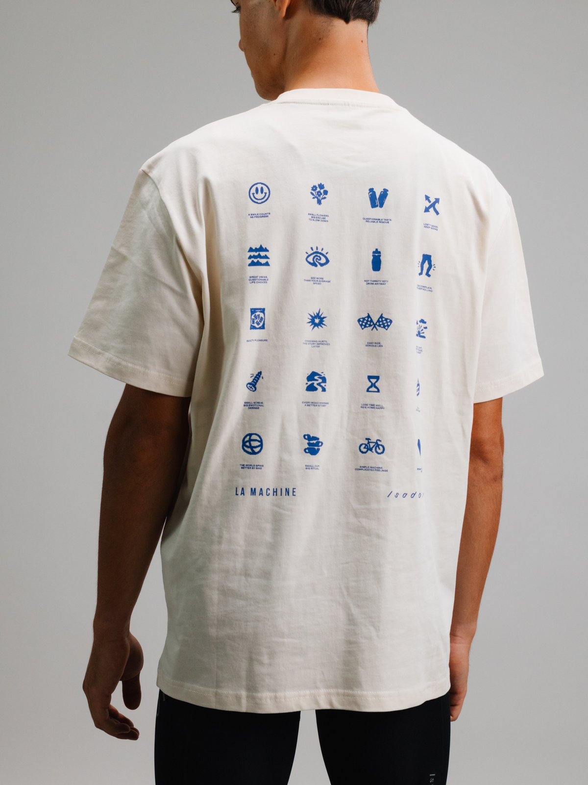 Close-up of the fabric and stitching on the beige Icons T-shirt.
