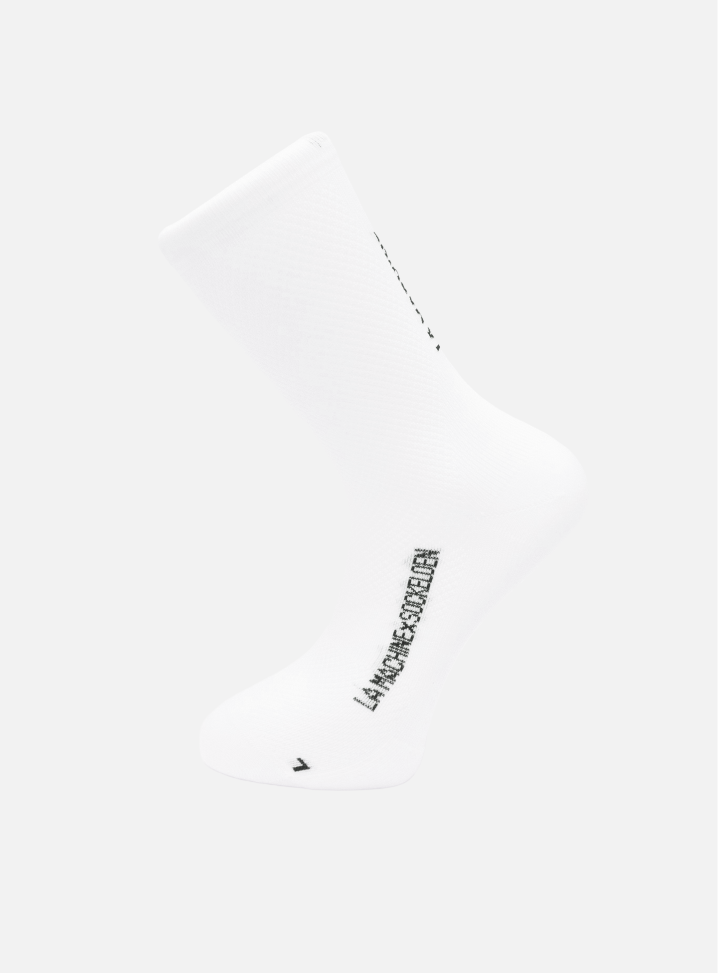 A single white La Machine Logo - Cycling Sock by La Machine Cycle Club is shown on a light gray background, featuring LA SAUCE SCORCH in black on the side—premium, high-profile socks designed for everyday cycling comfort.