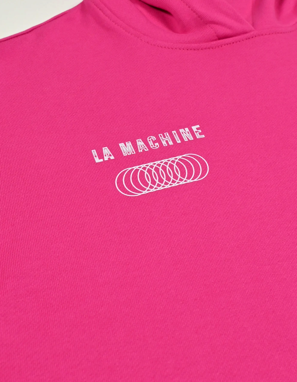 Detail of the fabric on the La Machine X EF Pro Cycling - Globe Hoodie - Pink by La Machine Cycle Club.