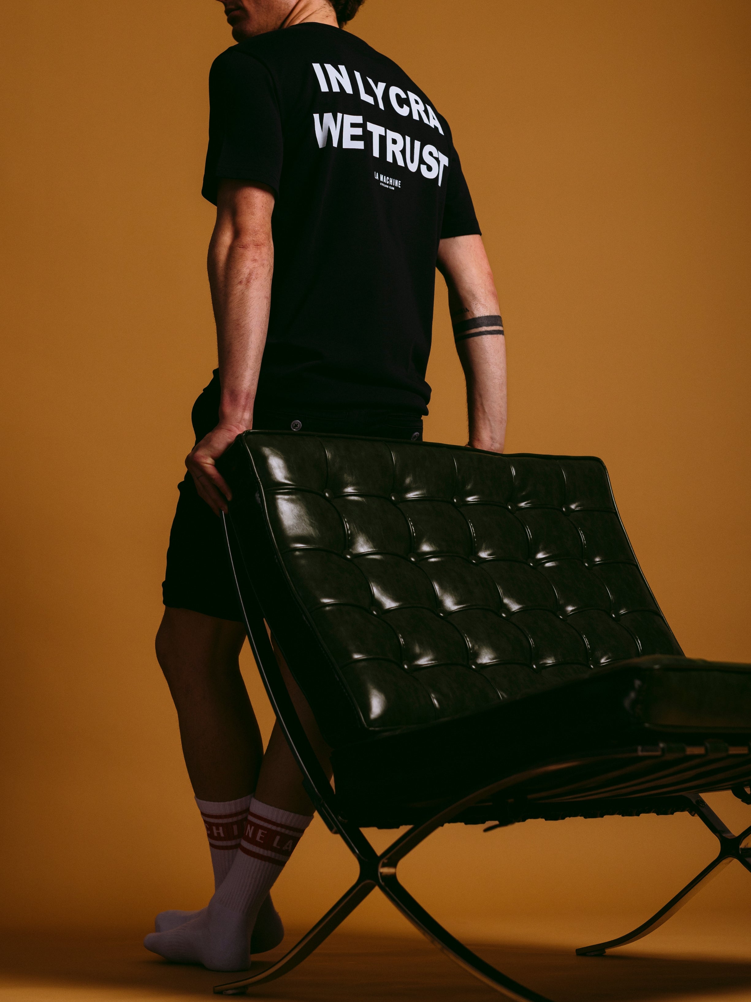 The In Lycra We Trust - T-shirt - Dark Navy Blue by La Machine Cycle Club, shown from another angle.
