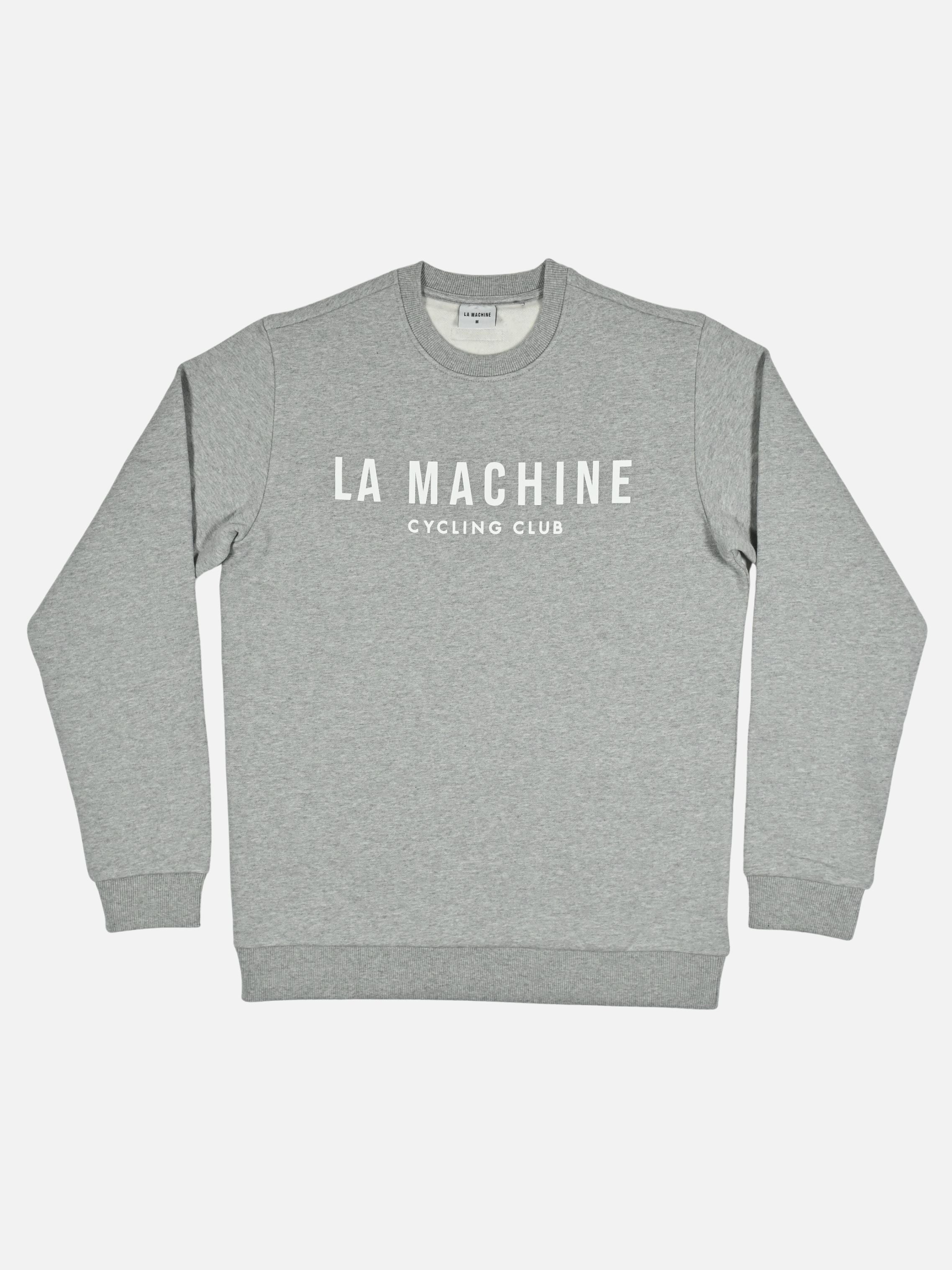 La Machine Club Line sweatshirt in grey melange with a small embroidered La Machine logo, shown on a plain background.