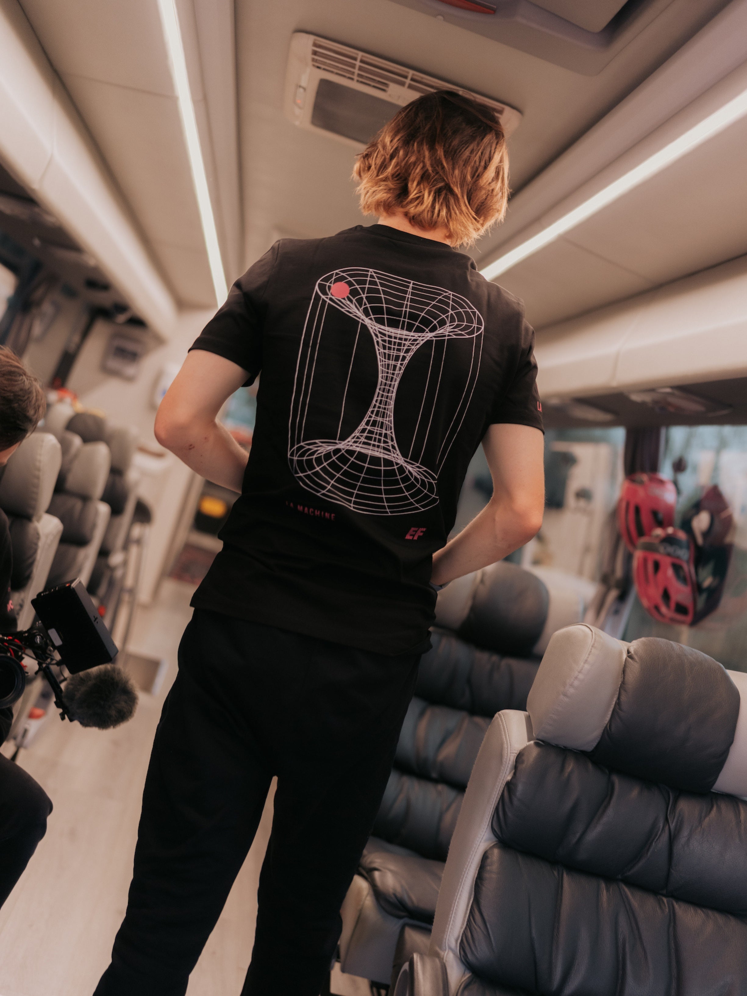 Detail view of the La Machine X EF Pro Cycling - Carroussel T-shirt - Black by La Machine Cycle Club.