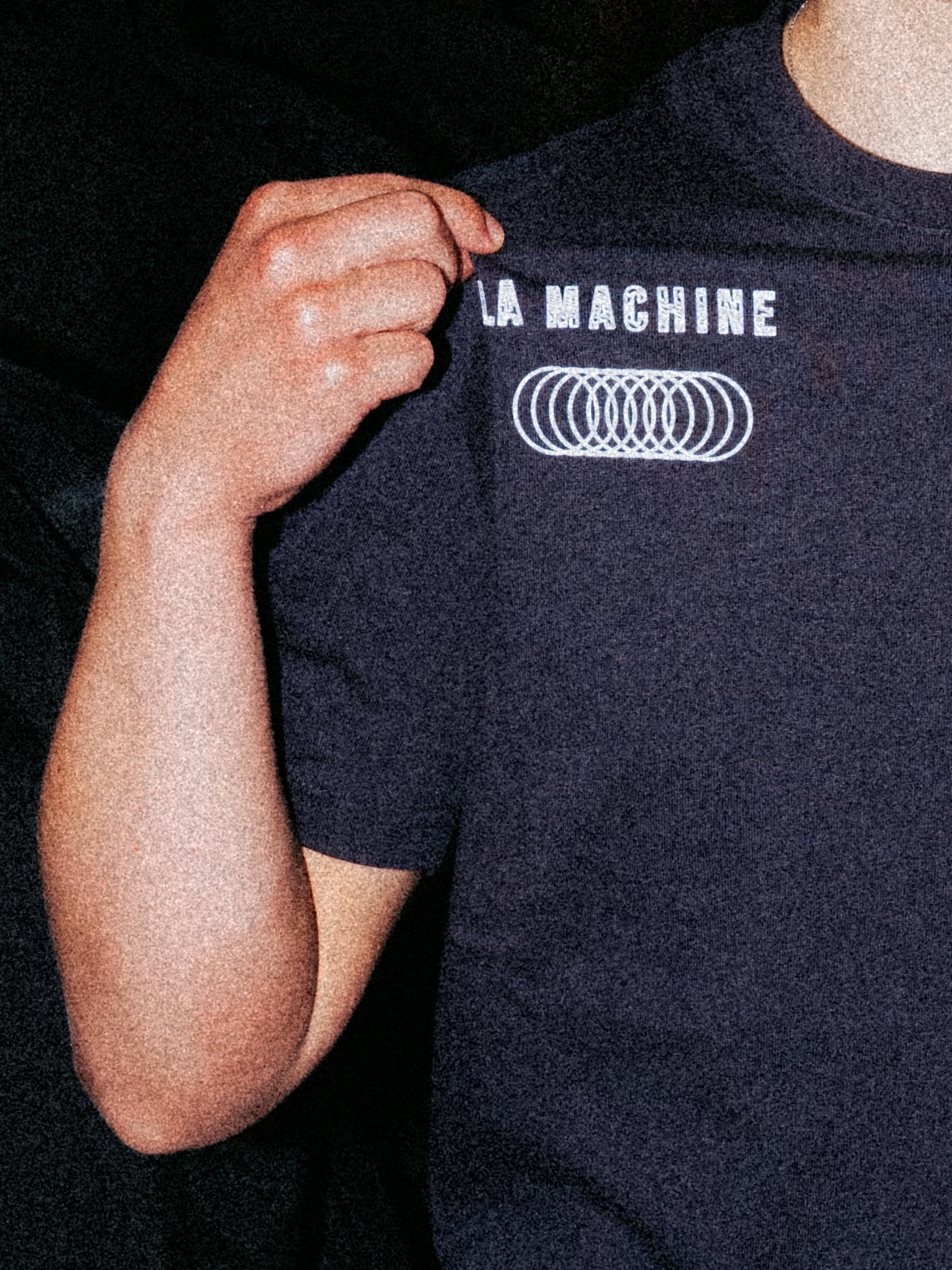 The La Machine X EF Pro Cycling - Globe T-shirt - Dark Navy Blue by La Machine Cycle Club, shown from another angle.