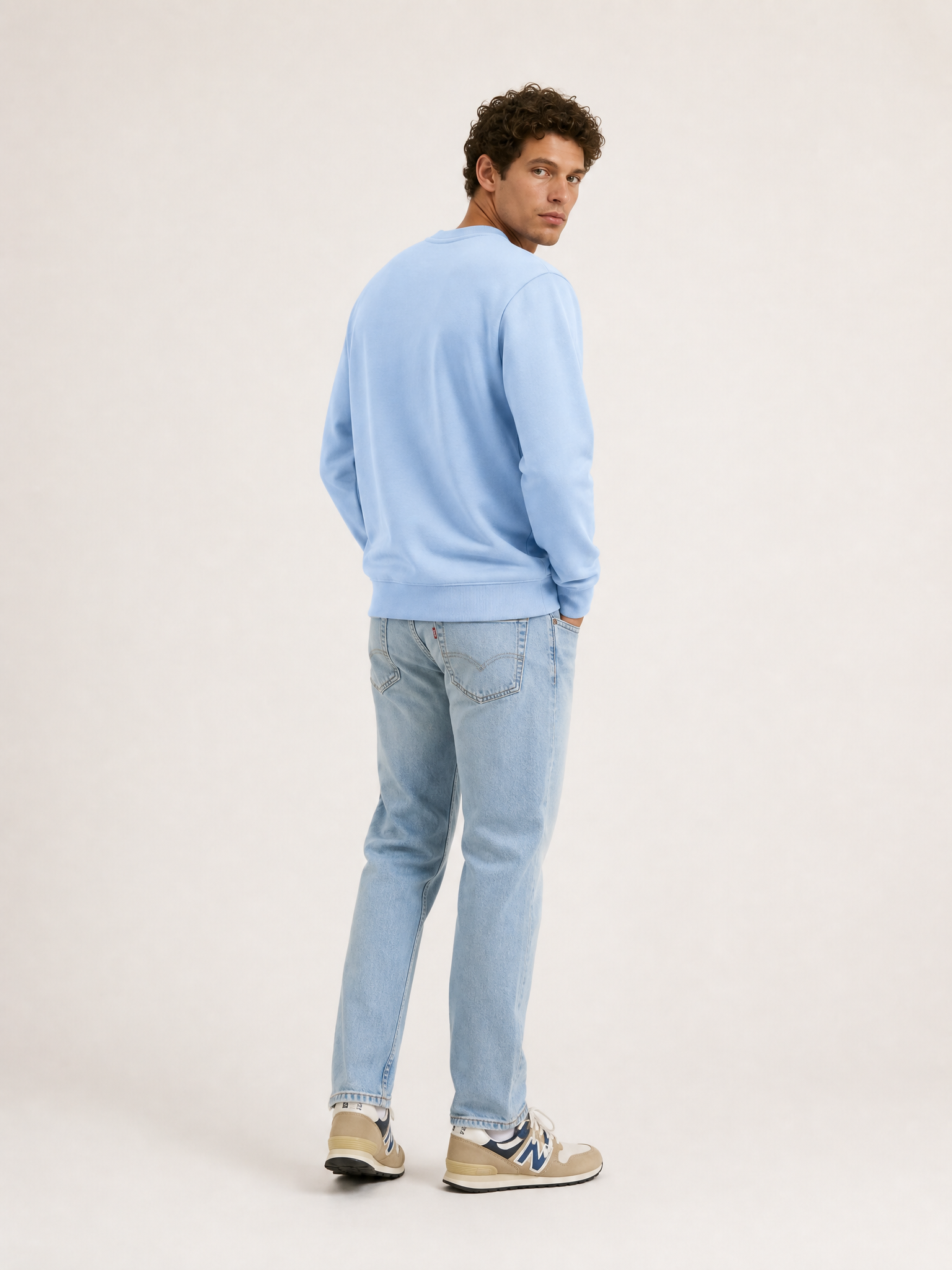 Back view of the Pedaleur de Charme - Sweatshirt - Light Blue by La Machine Cycle Club.