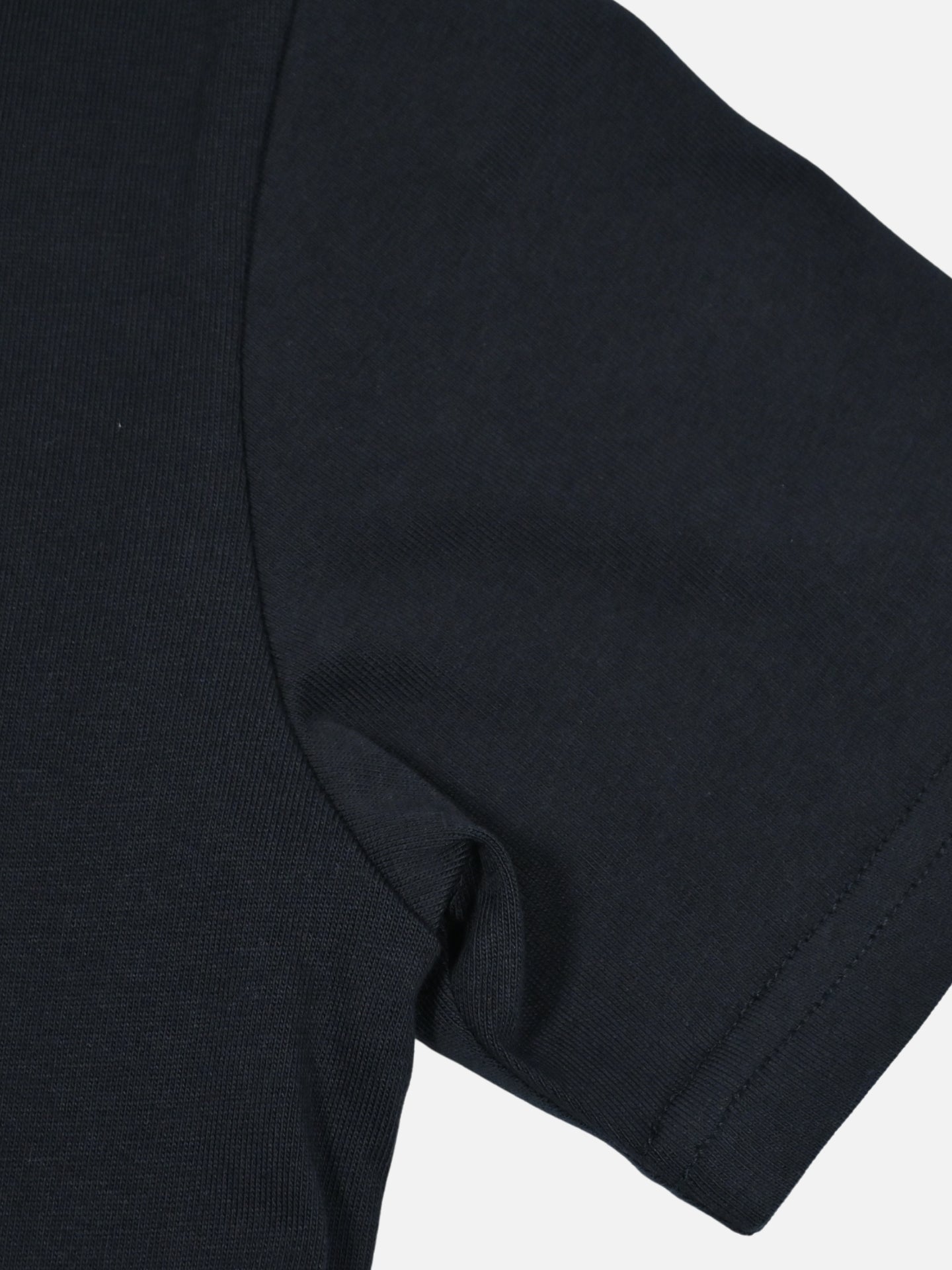 Detail view of the Petit - Bidon Bandit - T-shirt by La Machine Cycle Club.