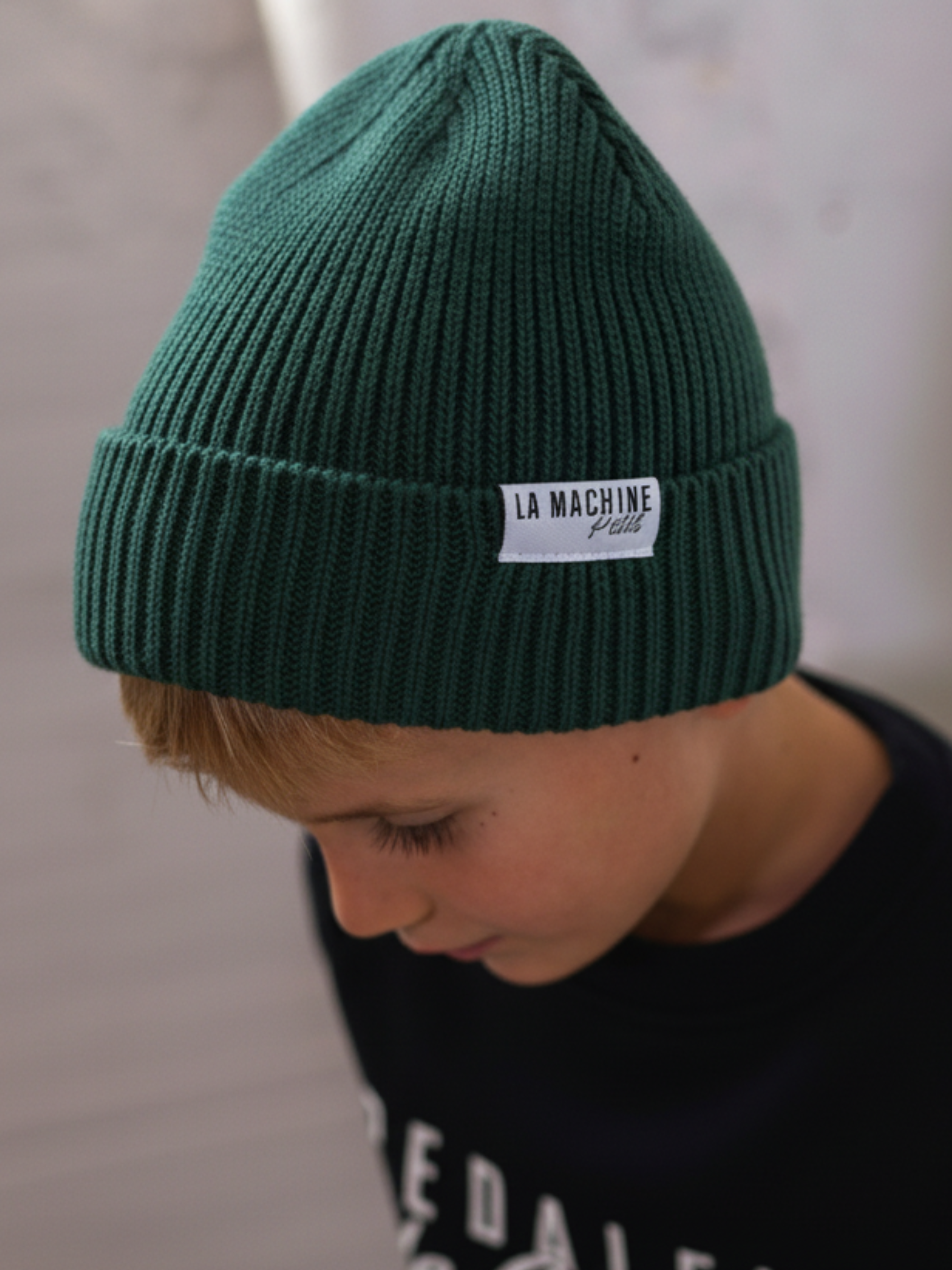 The Petit - La Machine Beanie - Soft Green by La Machine Cycle Club, shown from another angle.
