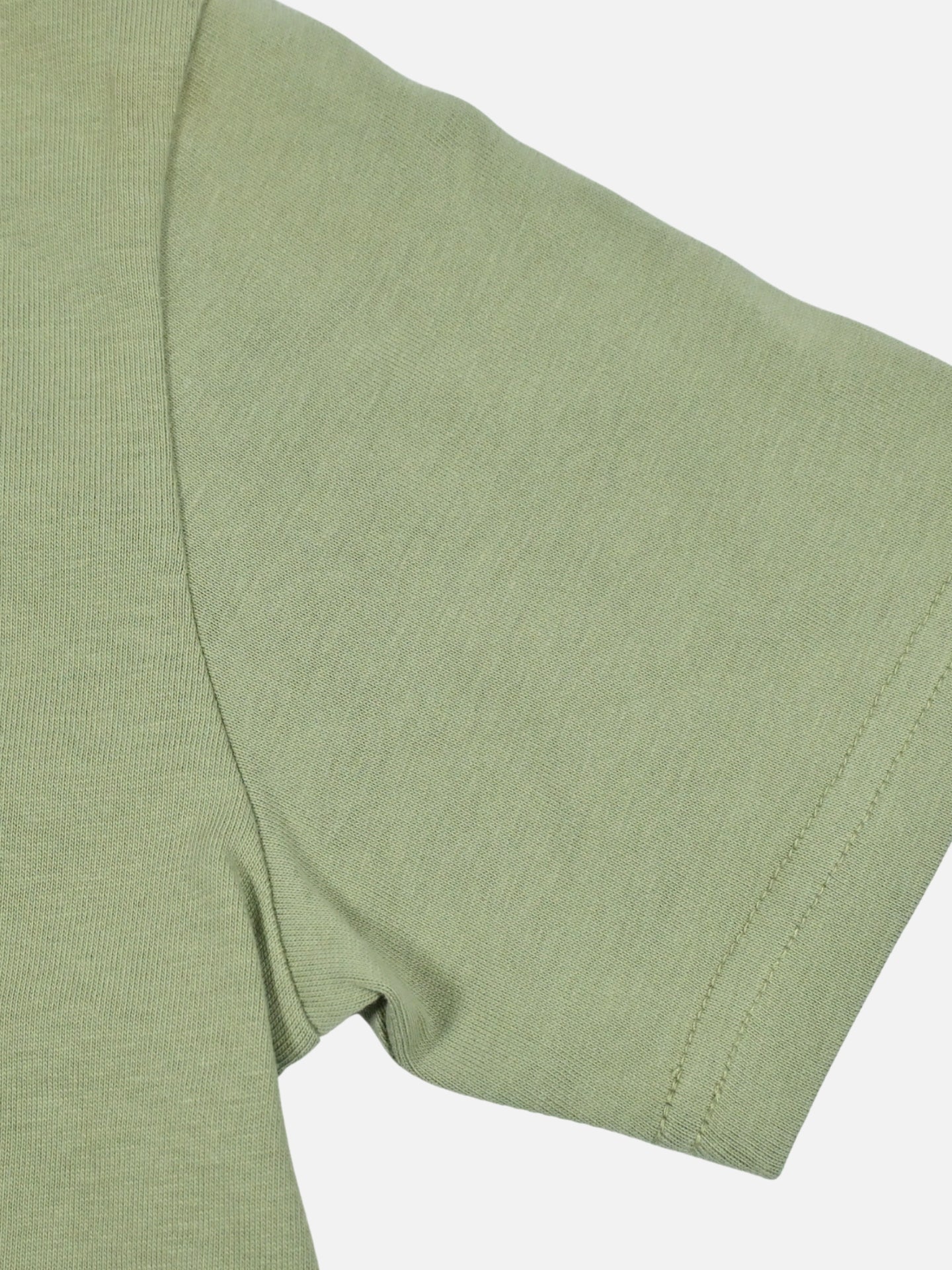 Detail view of the Petit - Petit Coureur - T-shirt by La Machine Cycle Club.