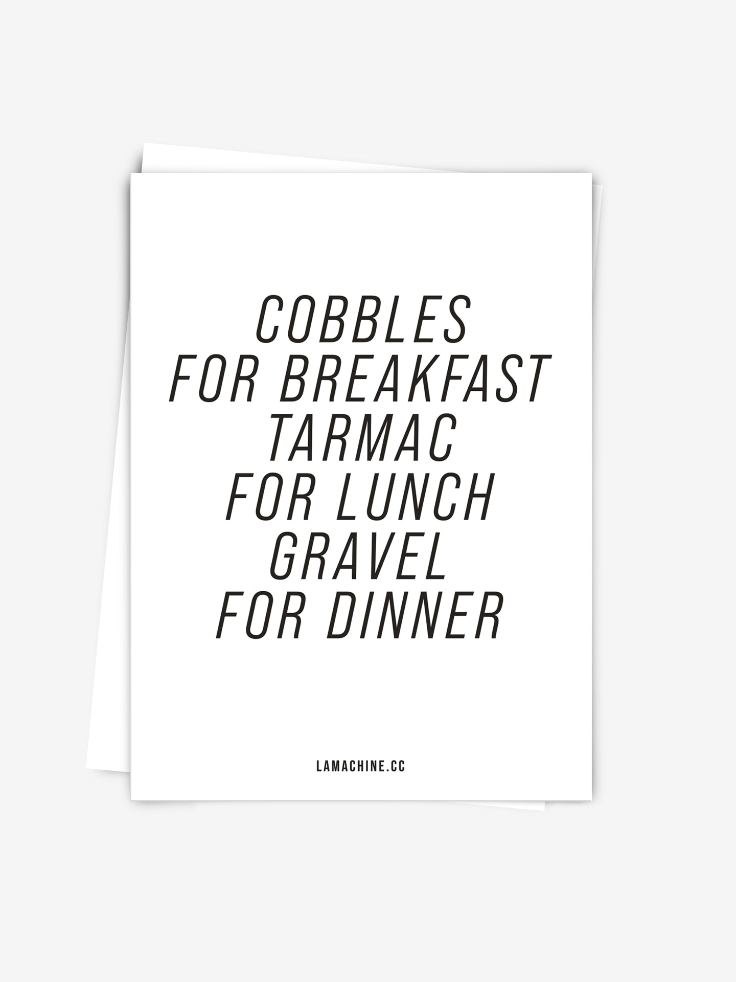 The Cobbles for Breakfast - Postcard by La Machine Cycle Club features bold black text: “Cobbles for breakfast, tarmac for lunch, gravel for dinner.” Perfect for snail mail. “lamachine.cc” is printed at the bottom.