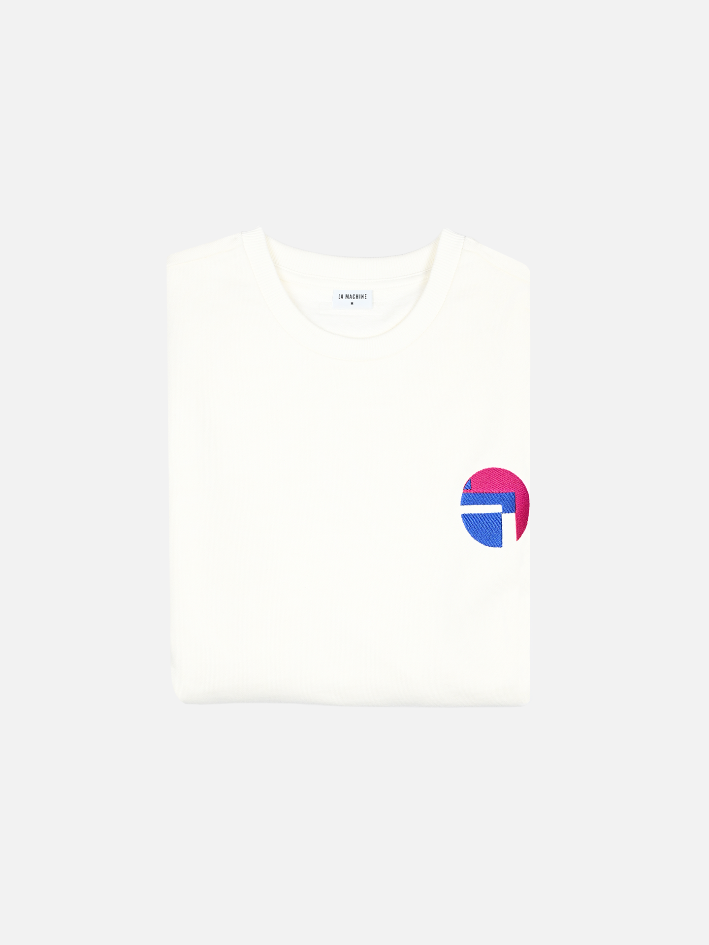 The Lampre Fondital 06 Sweatshirt in Star White by La Machine Cycle Club features a small pink and blue geometric logo on the chest—a minimal, classic look inspired by vintage cycling jerseys.