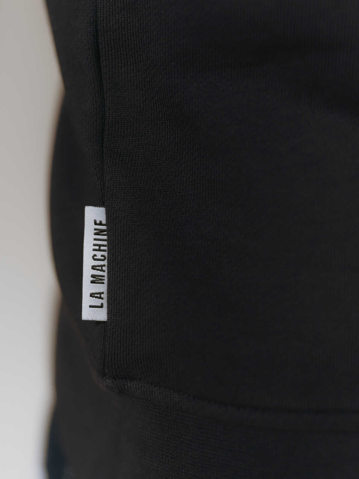 Side view of the Allez Allez Allez Sweatshirt in dark navy blue.