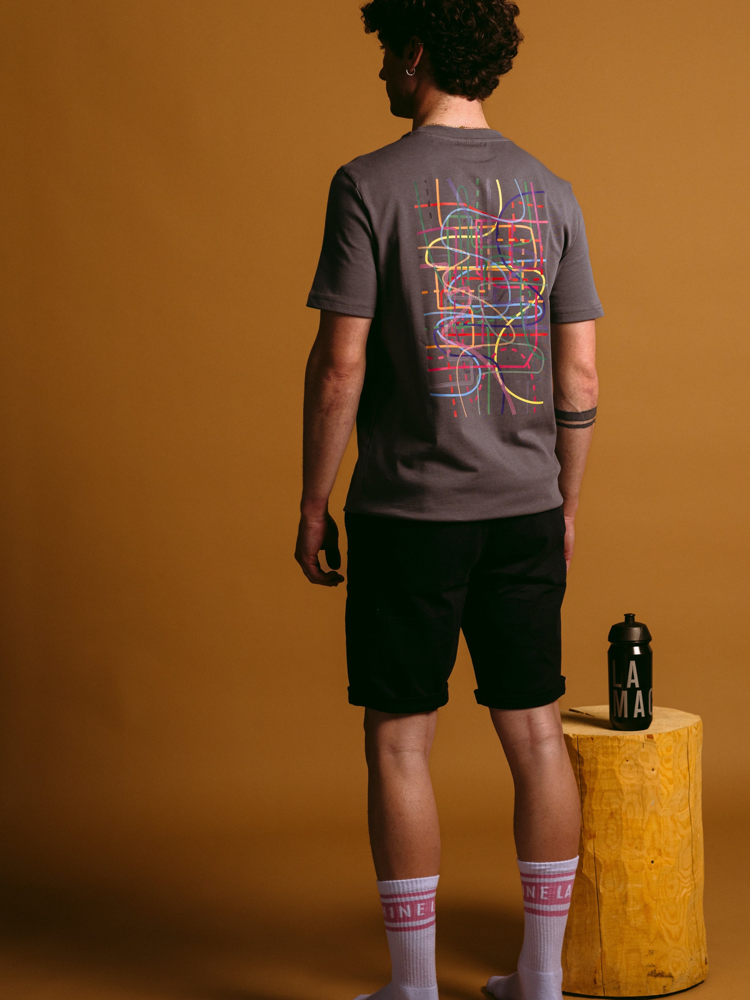 The Alpe D'Huez Subway - T-shirt - Steel Grey by La Machine Cycle Club, shown from another angle.