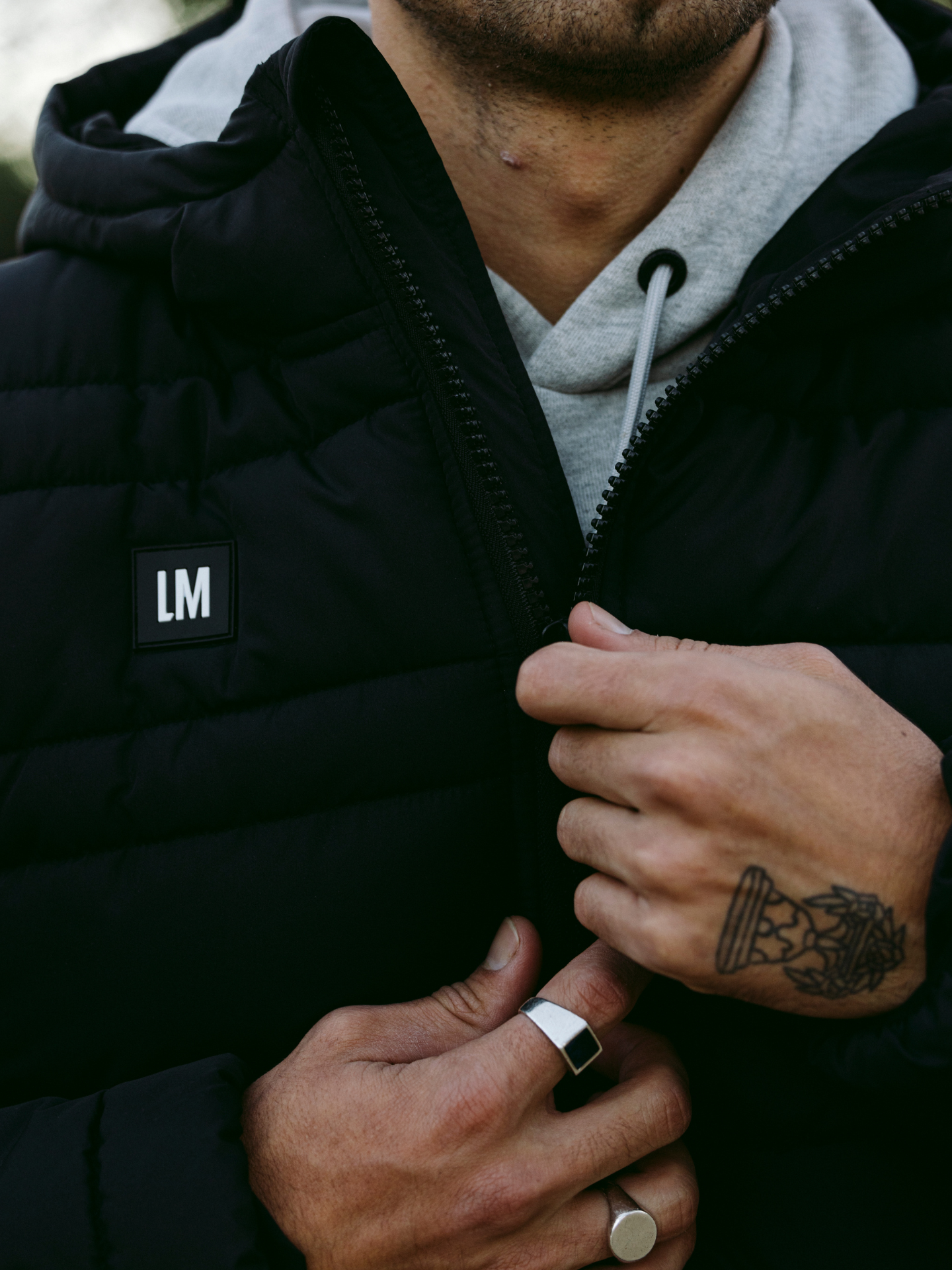 Additional view of the Beyond the bike - Padded Jacket - Black by La Machine Cycle Club.