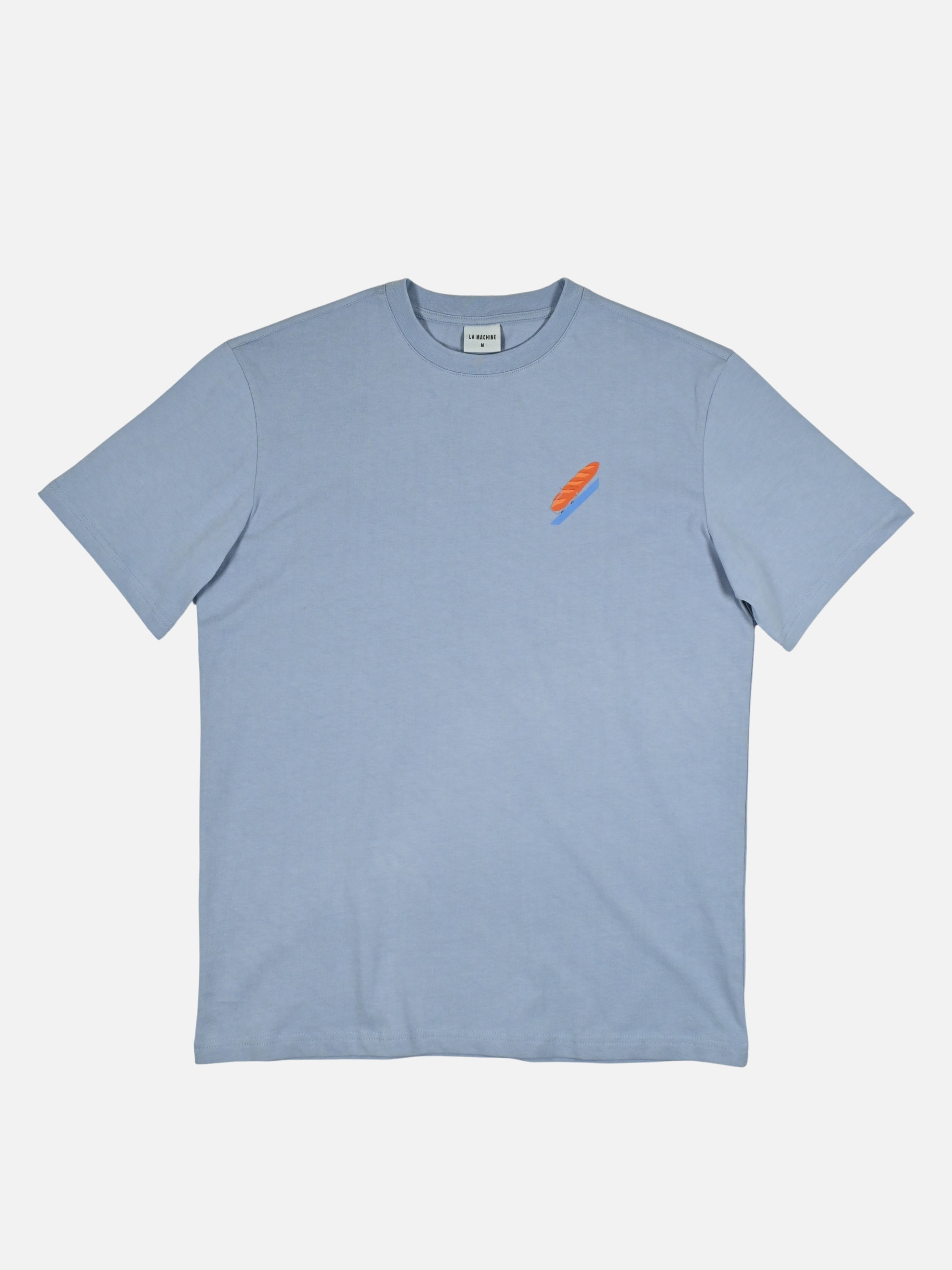 Loose-fit Bidon et Baguette t-shirt by La Machine, with a playful graphic of a water bottle and baguette celebrating the French mid-ride bakery stop.