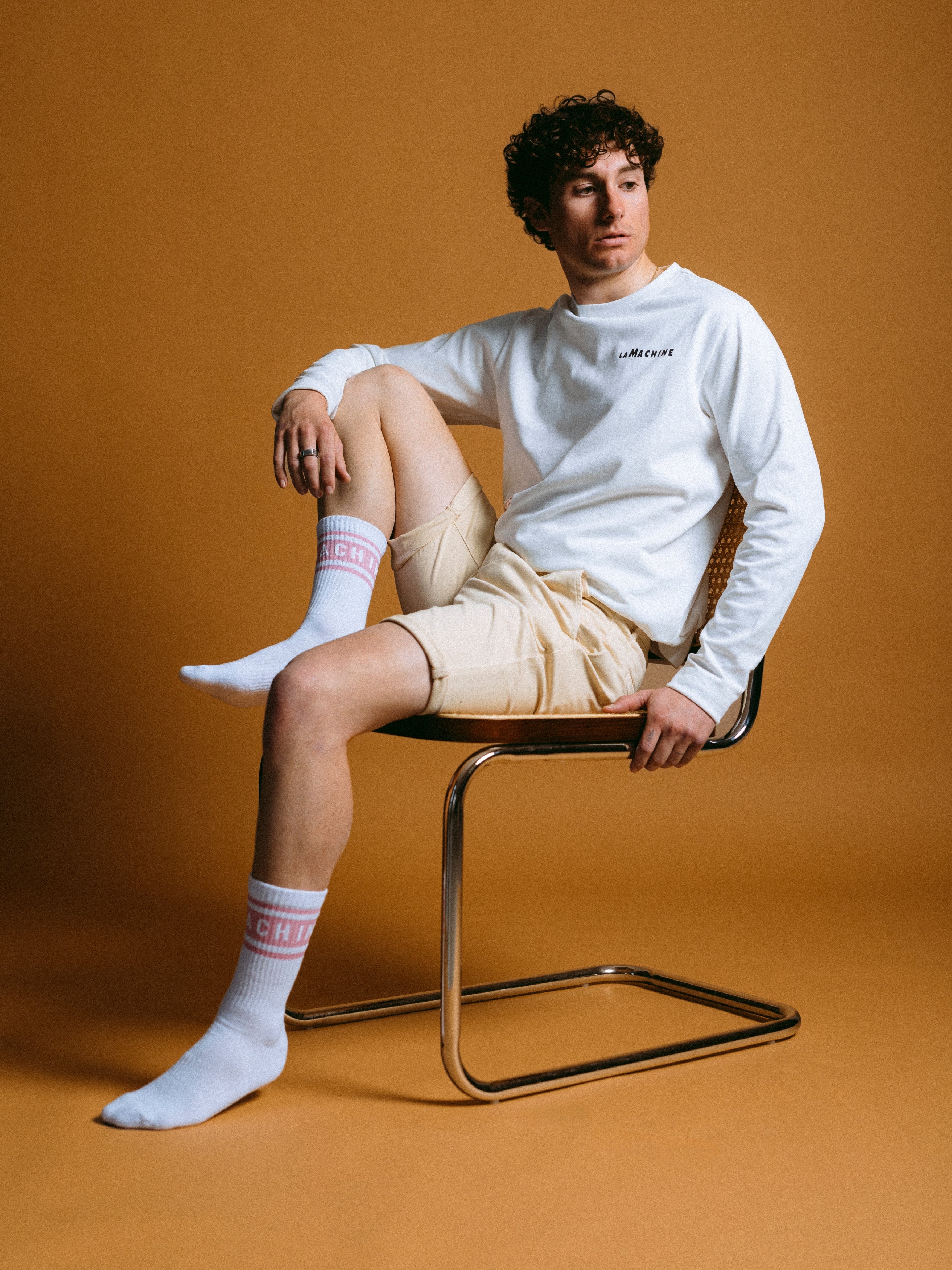 The Crémant for Coureurs - Longsleeve by La Machine Cycle Club, shown from another angle.