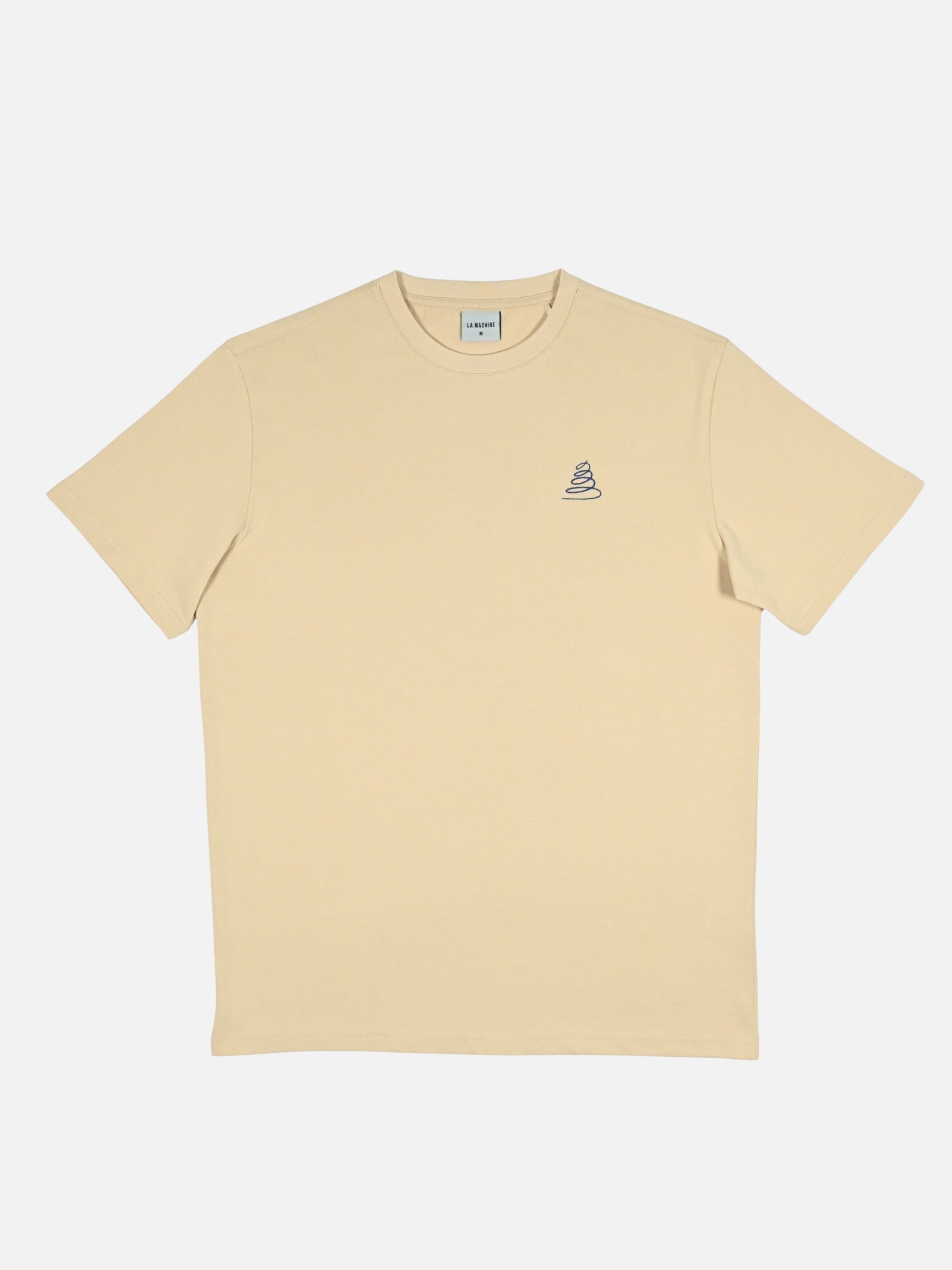 Loose-fit Crème de la Climb t-shirt by La Machine, with a single serpentine line tracing a mountain ascent — minimalist tribute to the finest climbs.