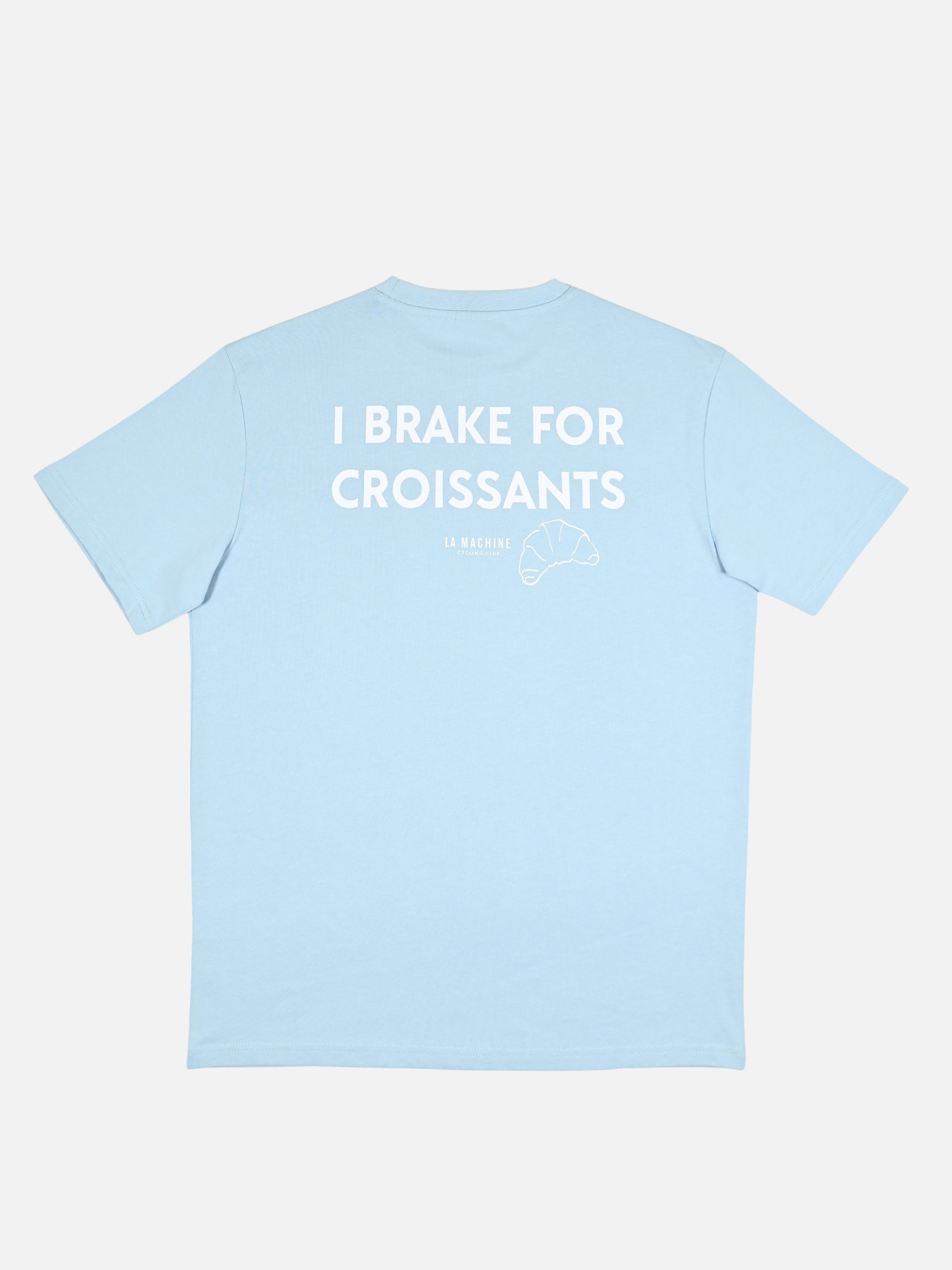 Light-blue I Brake for Croissants loose-fit t-shirt by La Machine, a playful statement tee for café-stop cyclists who put the boulangerie before the segment.
