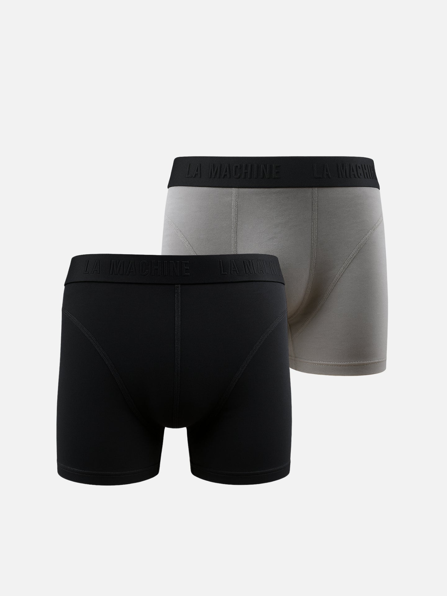 La Machine boxershorts tweepak voor wielrenners — één zwart en één grijs gemêleerd paar, weergegeven op een witte achtergrond.