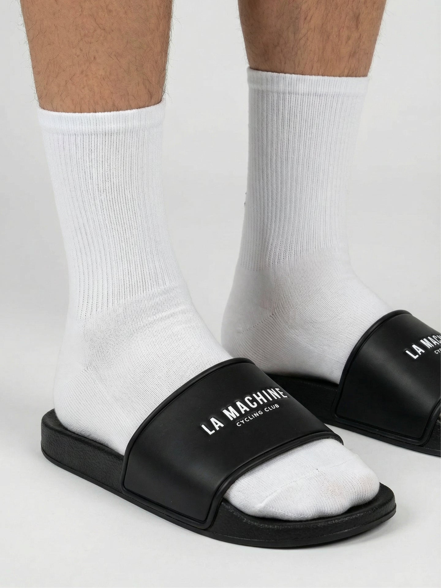 Detail view of the La Machine Logo Slides/Slippers by La Machine Cycle Club.