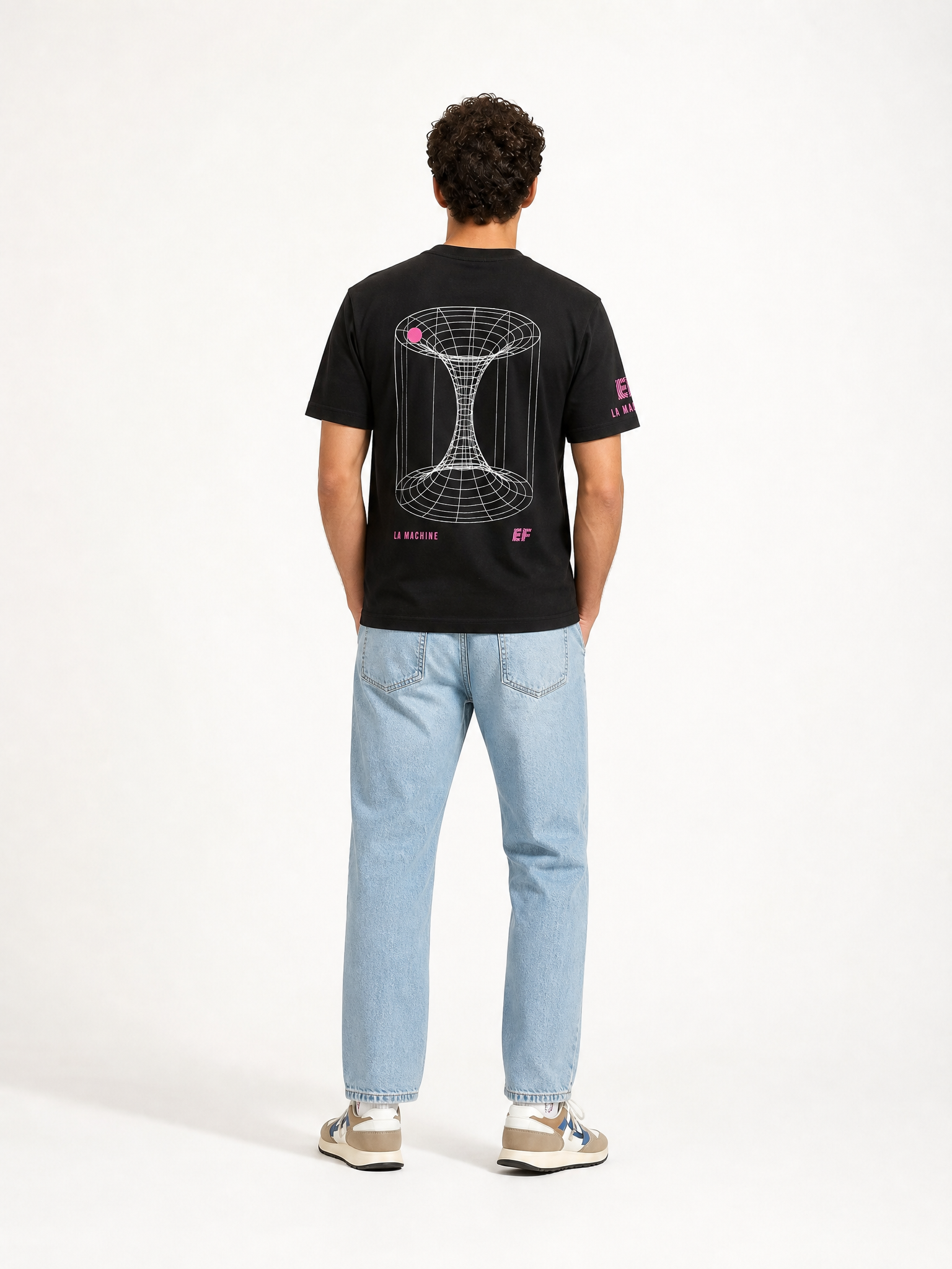 A model wearing the La Machine X EF Pro Cycling - Carroussel T-shirt - Black by La Machine Cycle Club.
