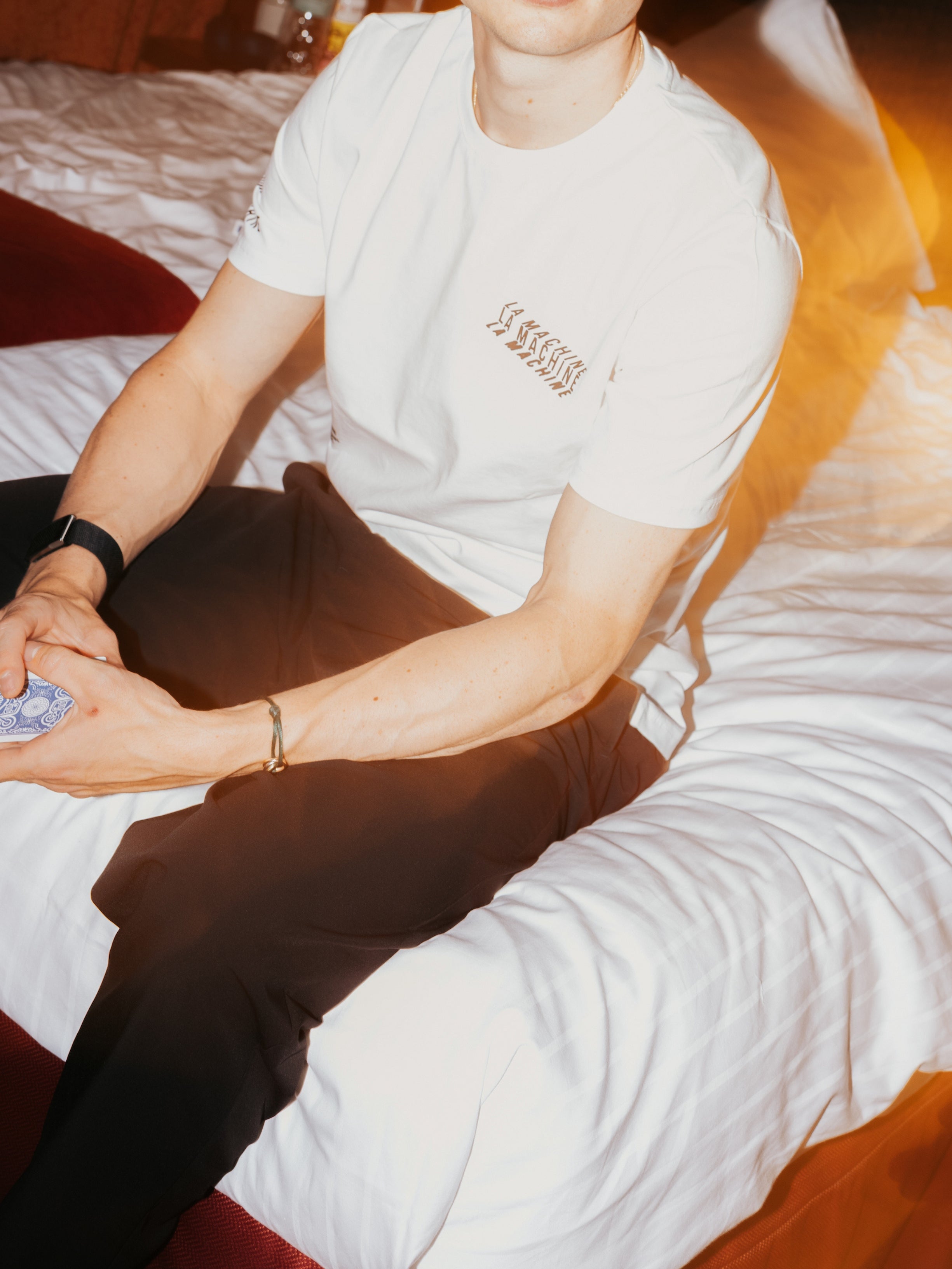 Detail view of the La Machine X EF Pro Cycling - Carroussel T-shirt - Off-White by La Machine Cycle Club.