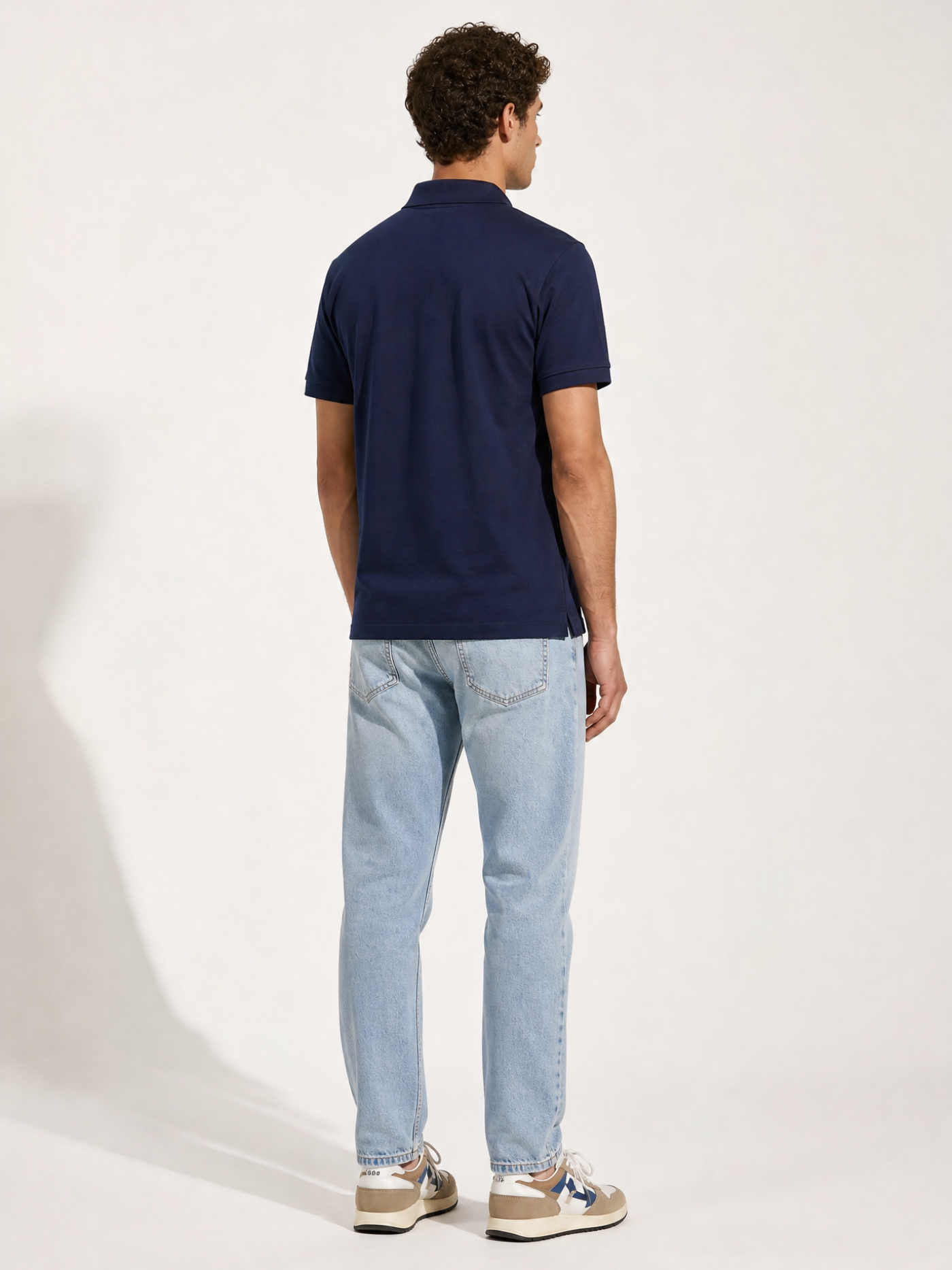 Detail view of the Grande Boucle - Polo Shirt - Navy by La Machine Cycle Club.