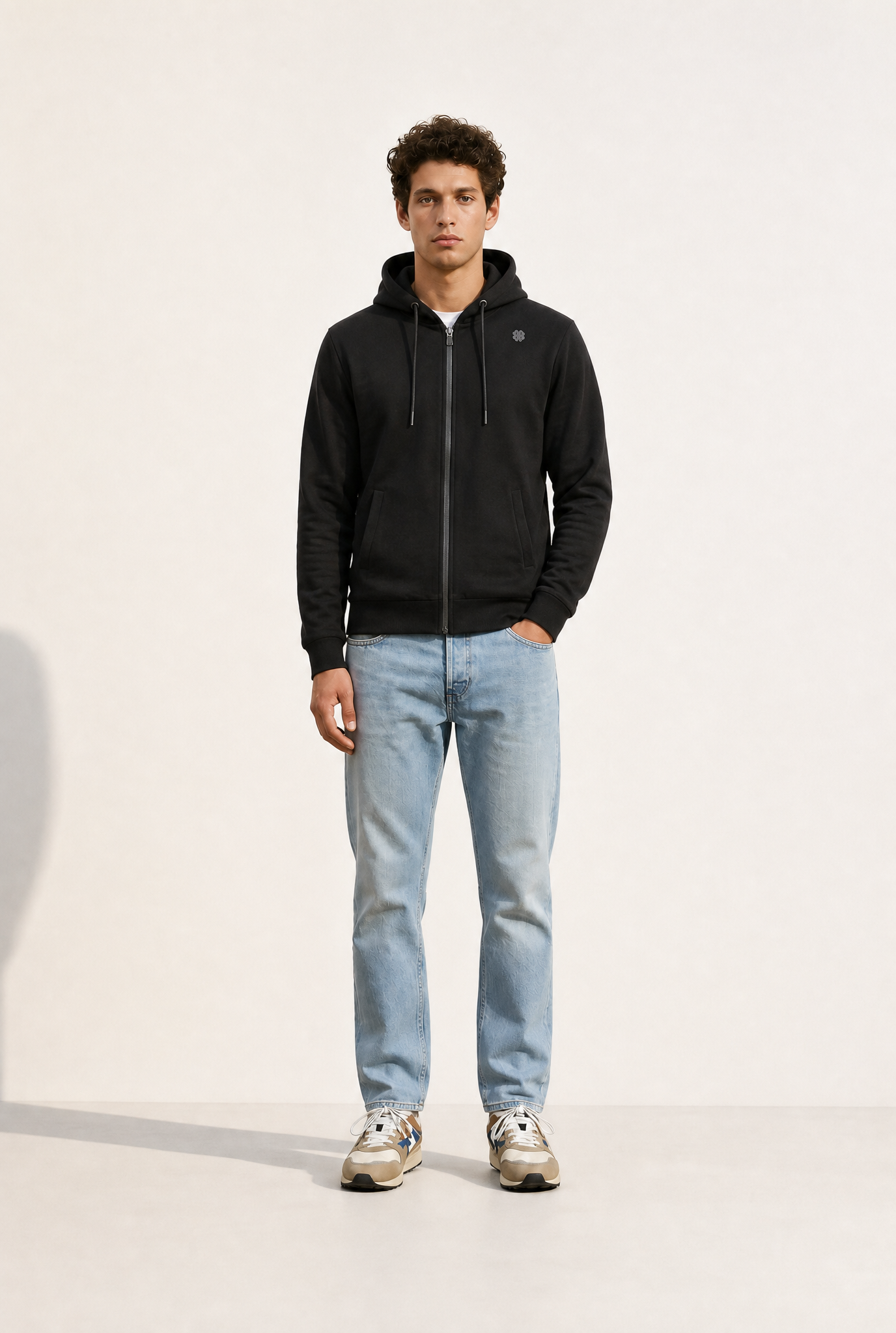 A model wearing the Lucky 13 - Zipped Hoodie - Black by La Machine Cycle Club.