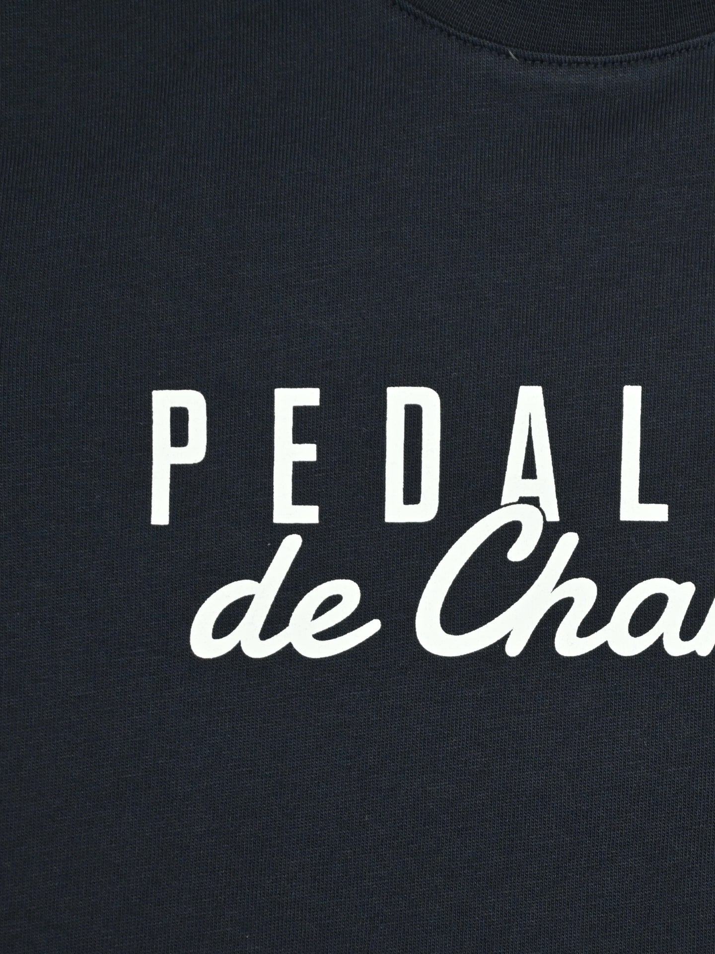Detail view of the Petit - Pedaleur de Charme - T-shirt by La Machine Cycle Club.