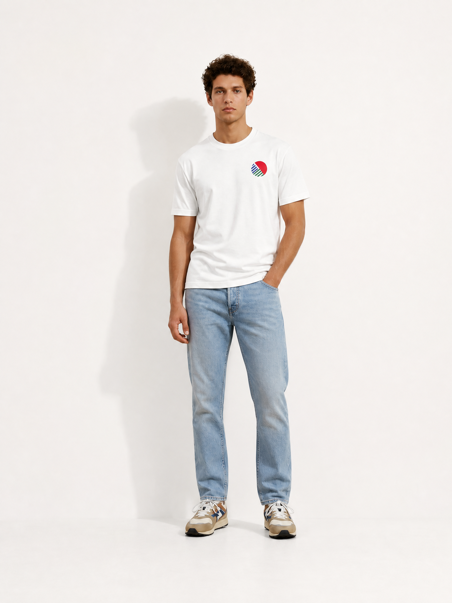 A model wearing the Team Toshiba '90 - Loose Fit - T-shirt by La Machine Cycle Club.